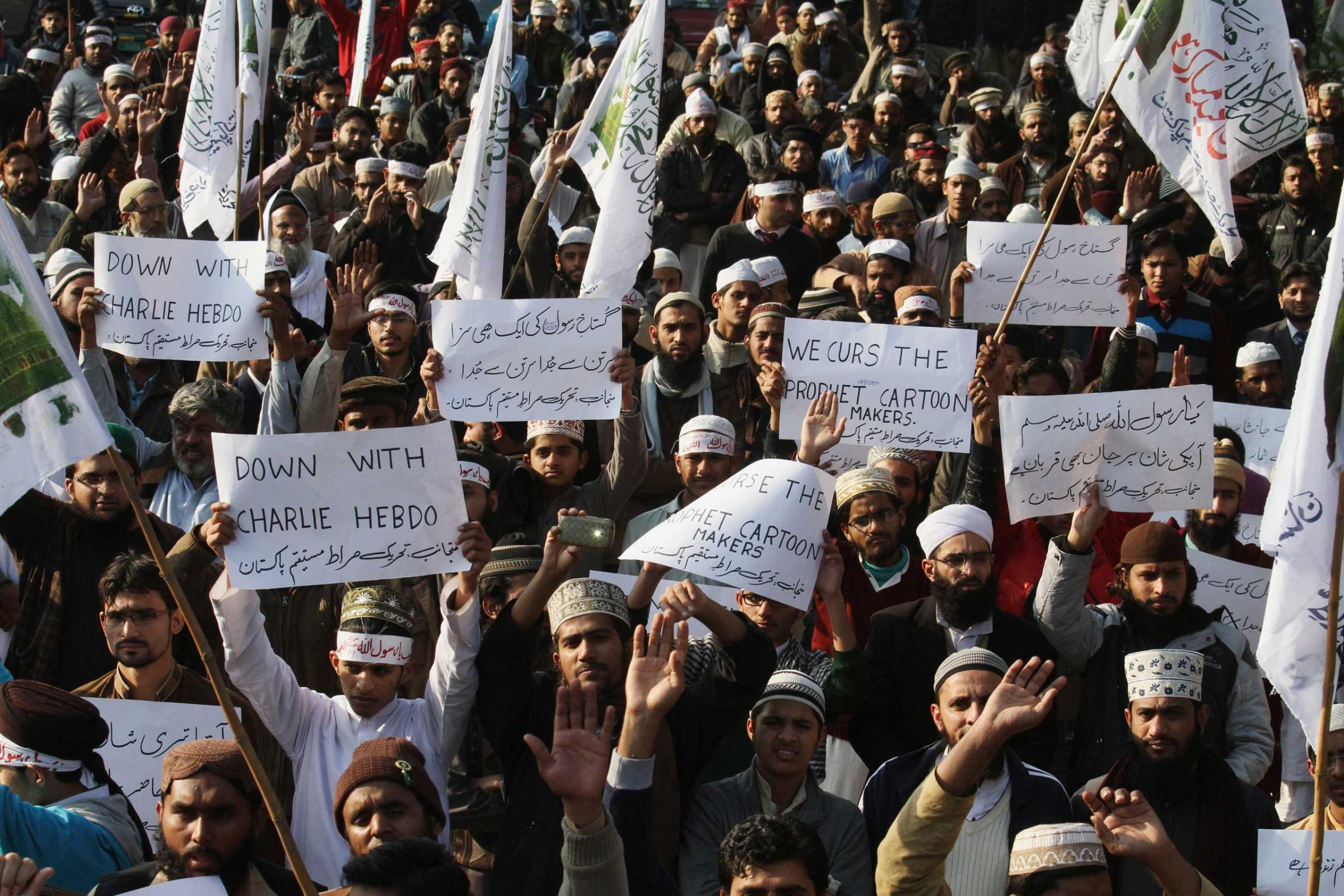 Supporters of a Pakistani religious group rally to protest against caricatures published in the French magazine Charlie Hebdo, in Lahore, Pakistan on Jan. 15, 2015.