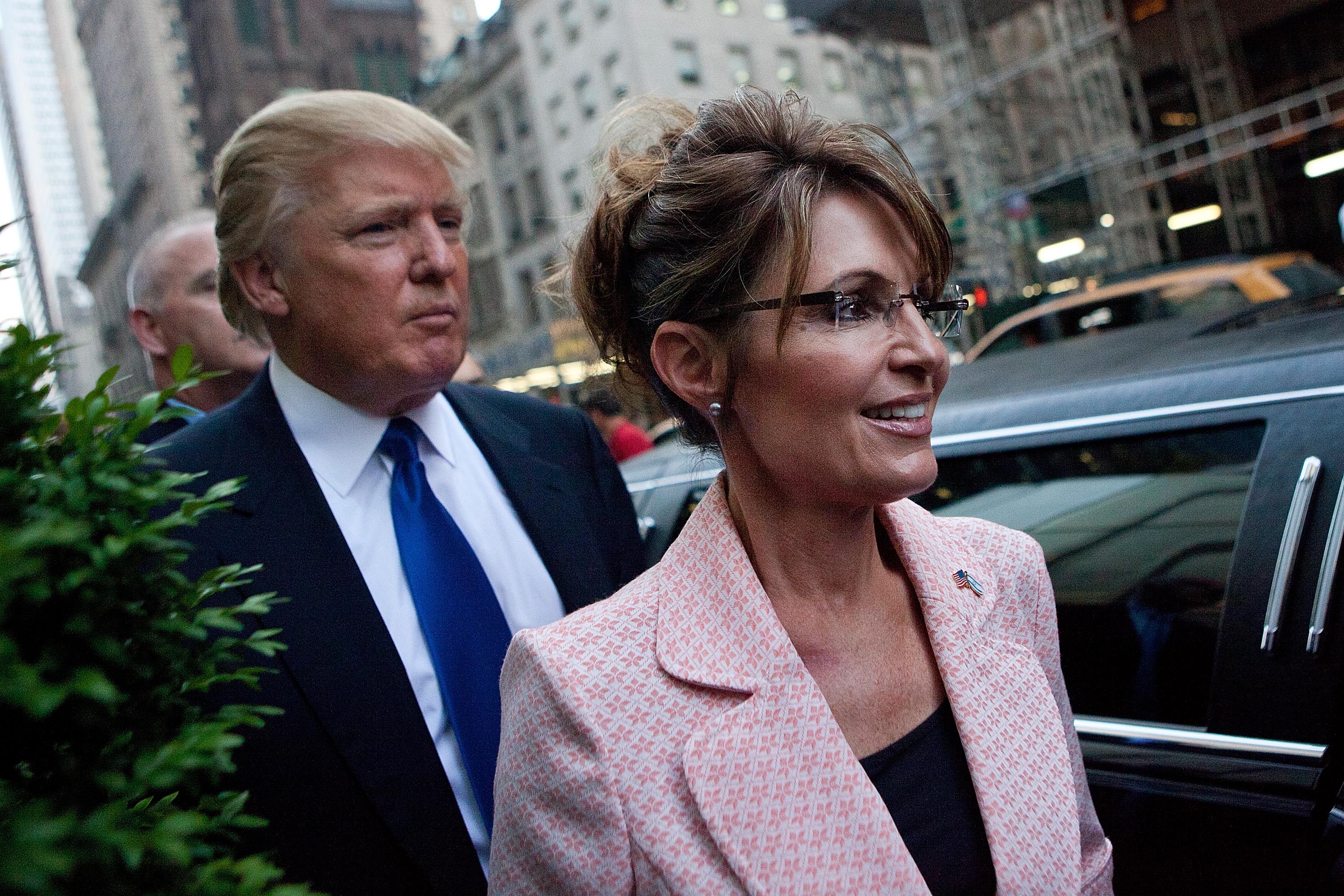 Former U.S. Vice presidential candidate and Alaska Governor Sarah Palin and Donald Trump walk towards a limo after leaving Trump Tower at 56th Street and 5th Avenue on May 31, 2011 in New York City. (Andrew Burton—Getty Images)