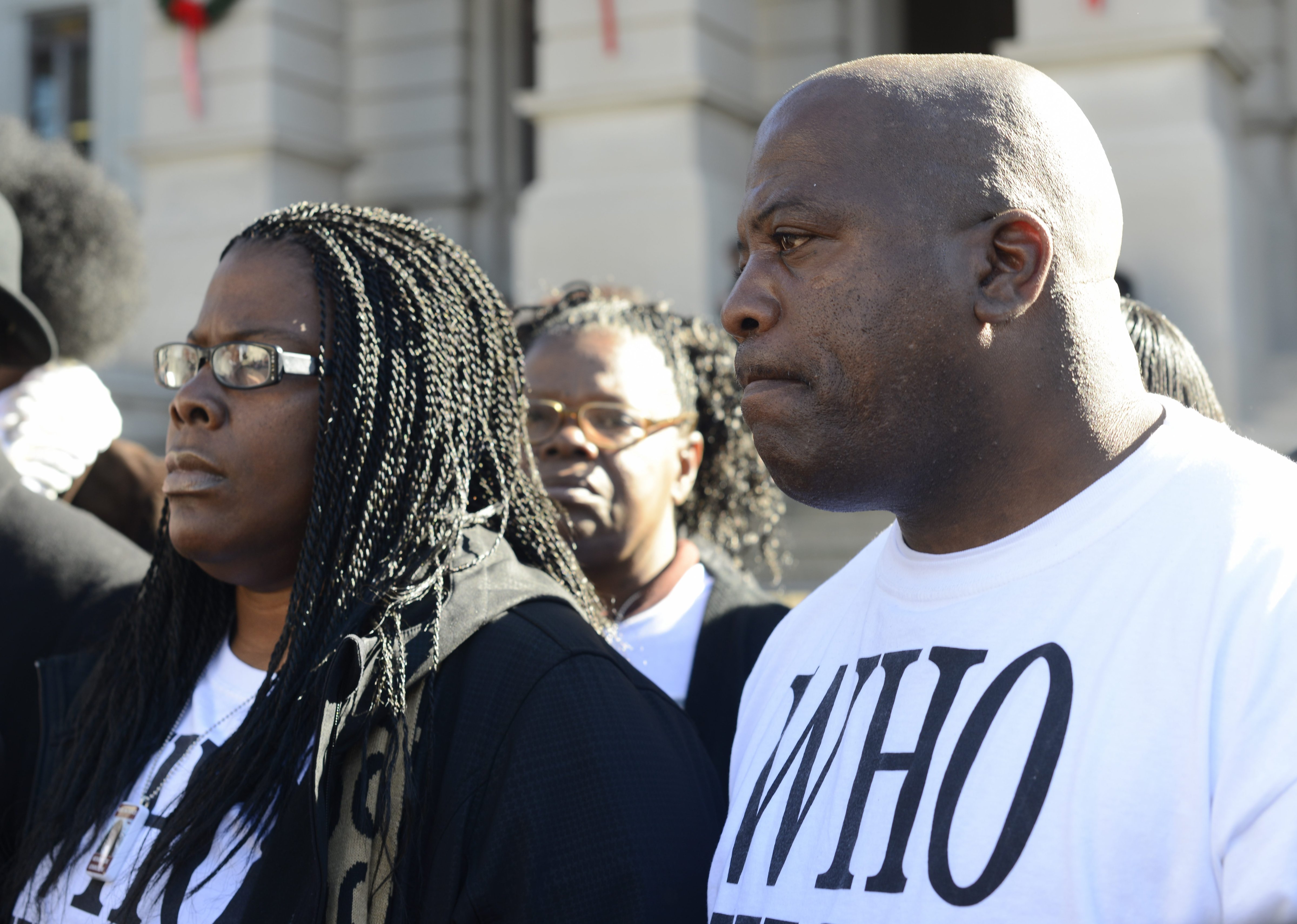 Jacqueline Johnson (left) and her husband Kenneth (right) participate in a rally on behalf of their dead son Kendrick Johnson at the Georgia State Capitol in Atlanta on  Dec. 11, 2013.