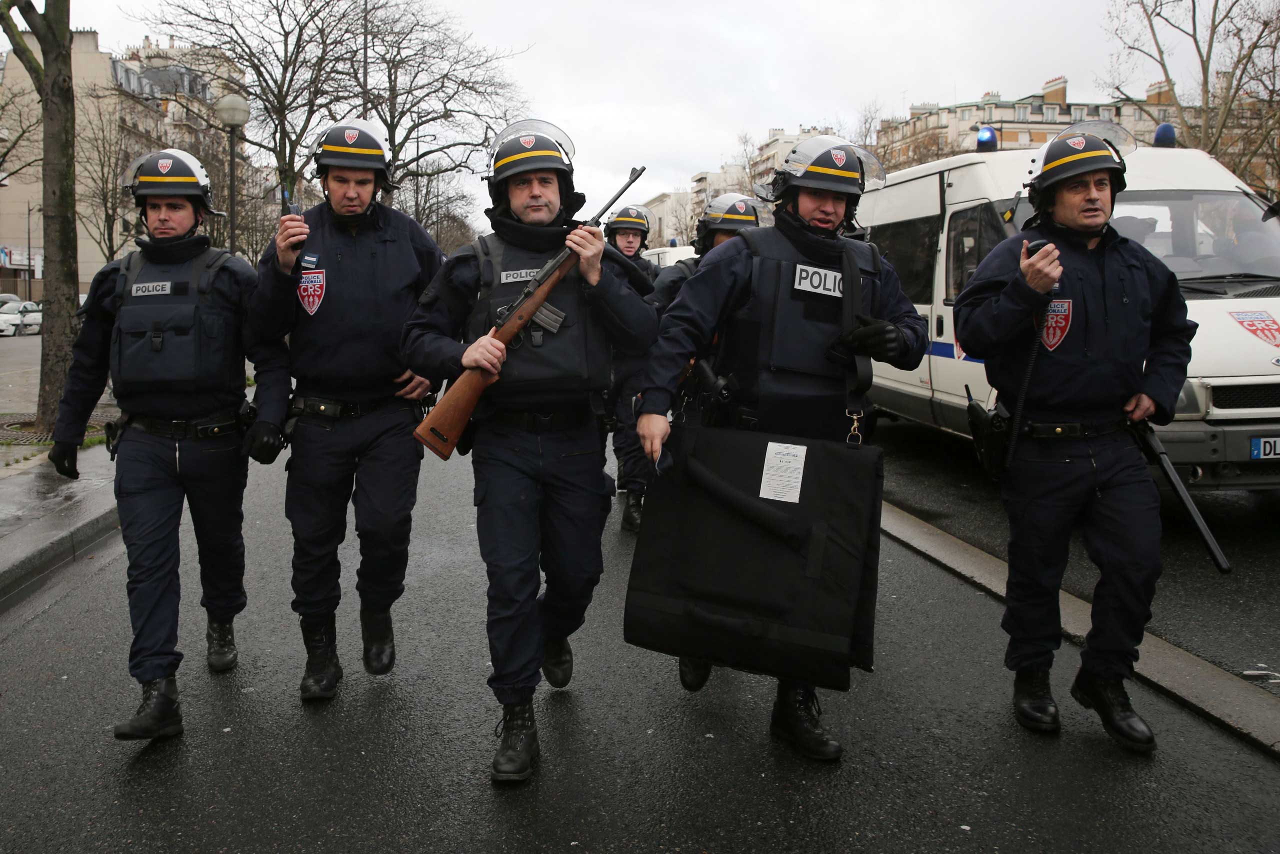 Police arrive with guns at Port de Vincennes on Jan. 9, 2015 in Paris. (Dan Kitwood—Getty Images)