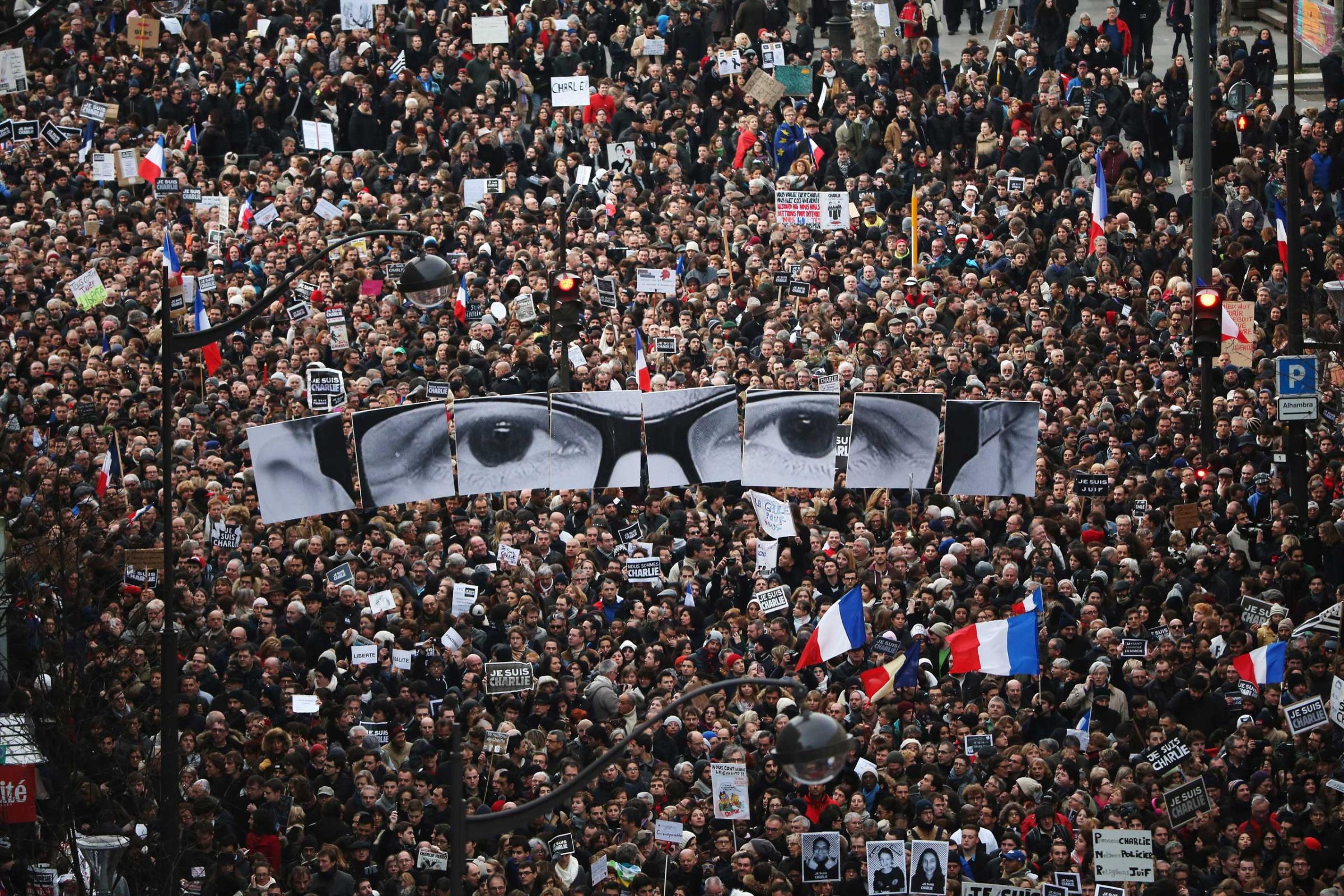 Demonstrators make their way along Boulevrd Voltaire in a unity rally in Paris following the recent terrorist attacks on Jan. 11, 2015 in Paris.