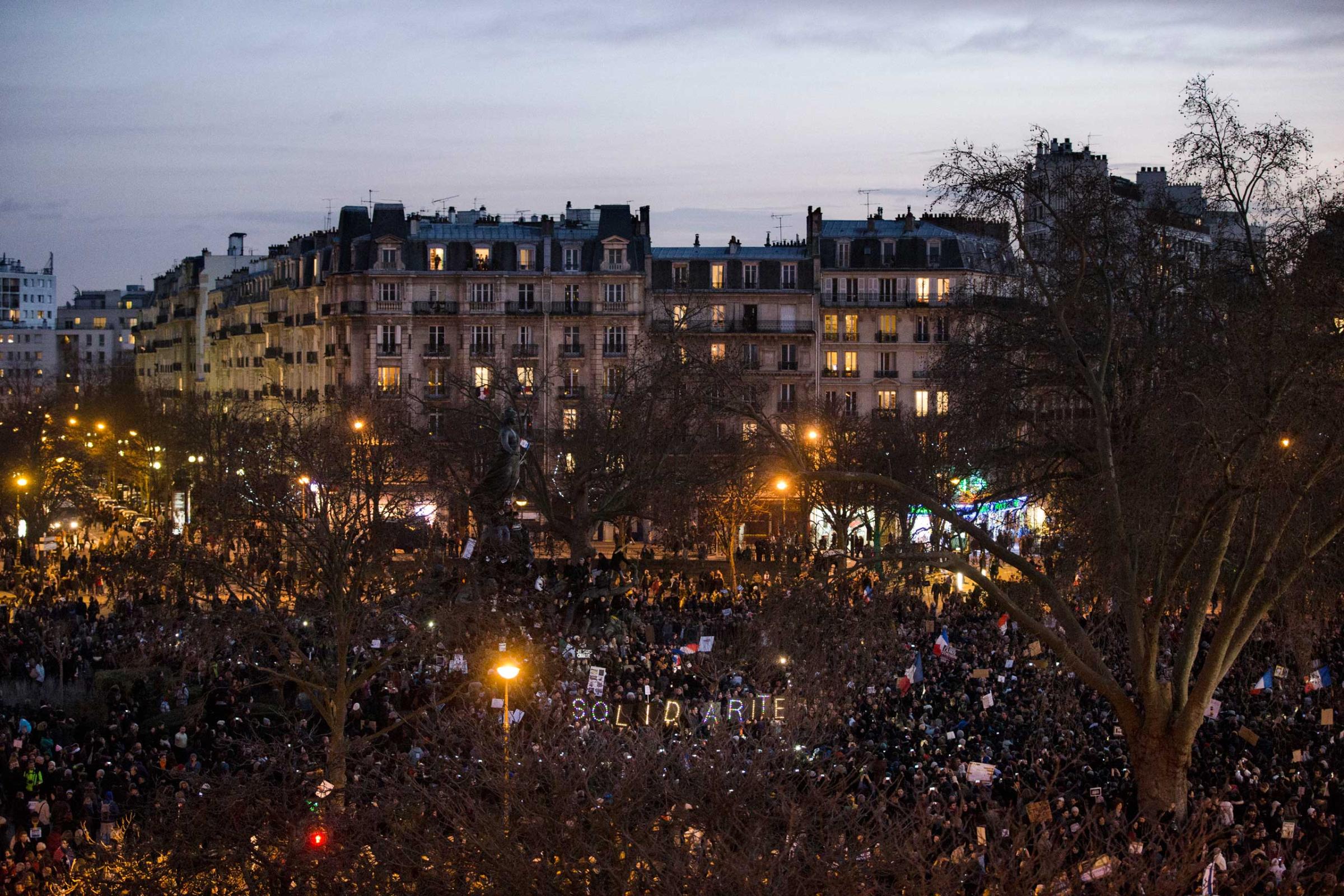 People gather at the Place de la Nation in Paris, Jan. 11, 2015.