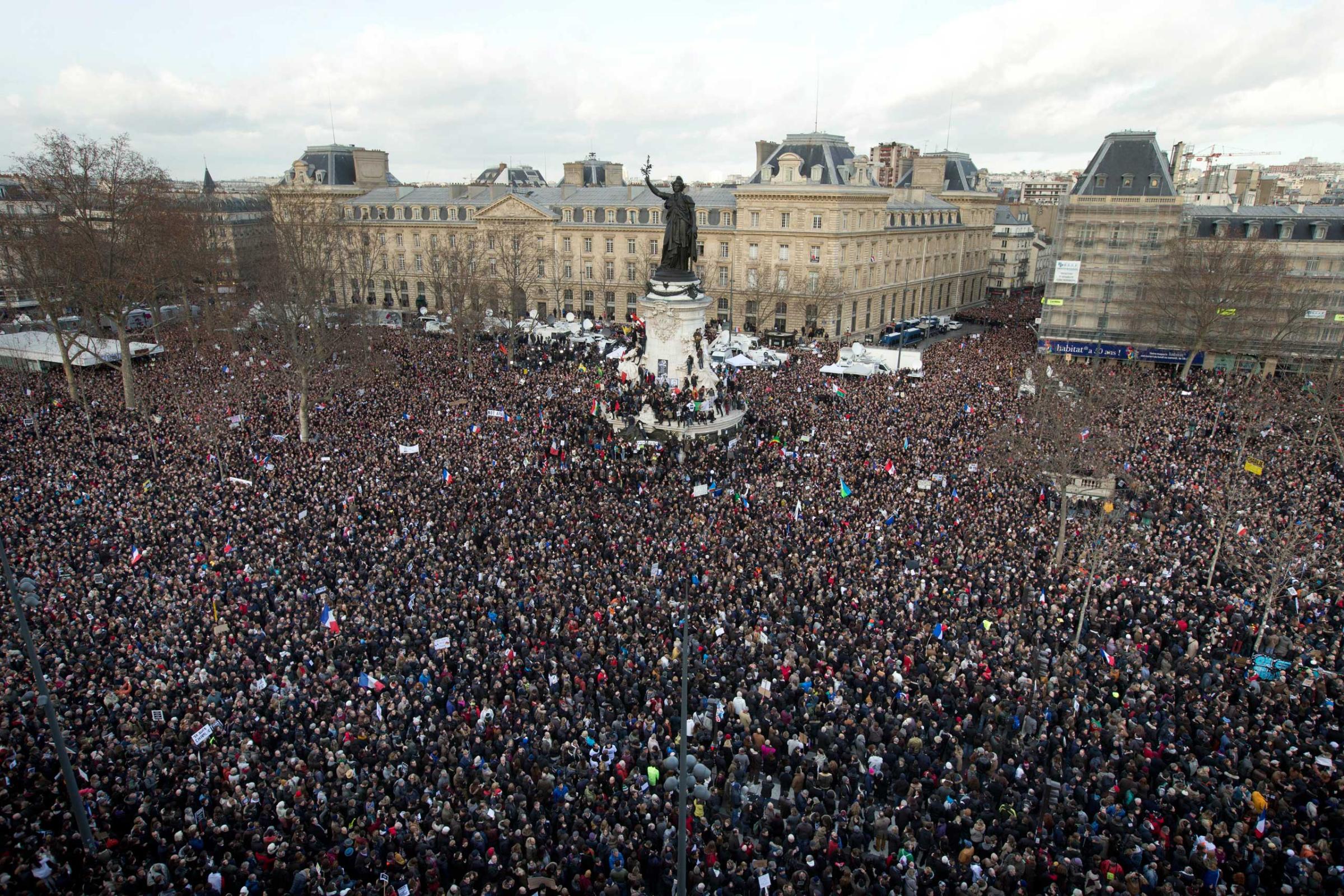 Thousands of people gather at Republique square in Paris, Jan. 11, 2015.