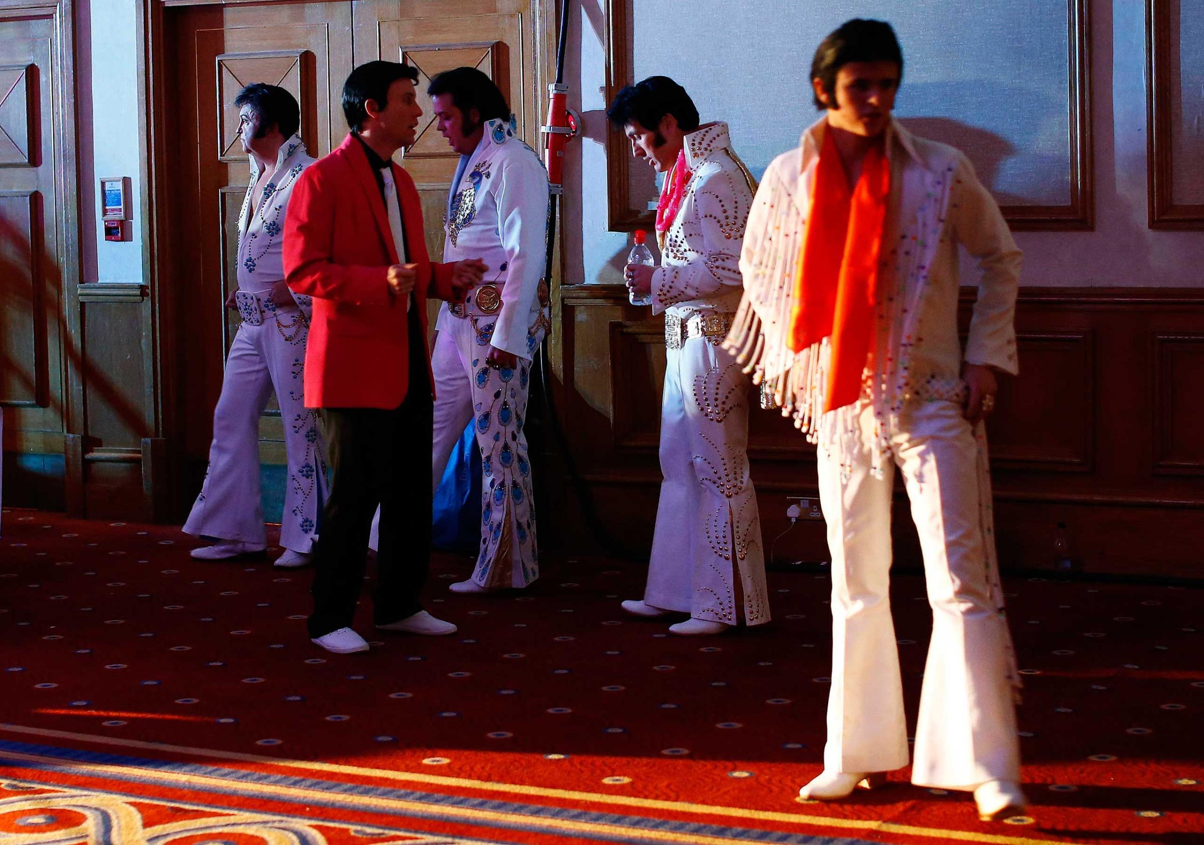 Jan. 4, 2015. Finalists wait backstage before their performances during the annual European Elvis Tribute Artist Contest and Convention in Birmingham, England.