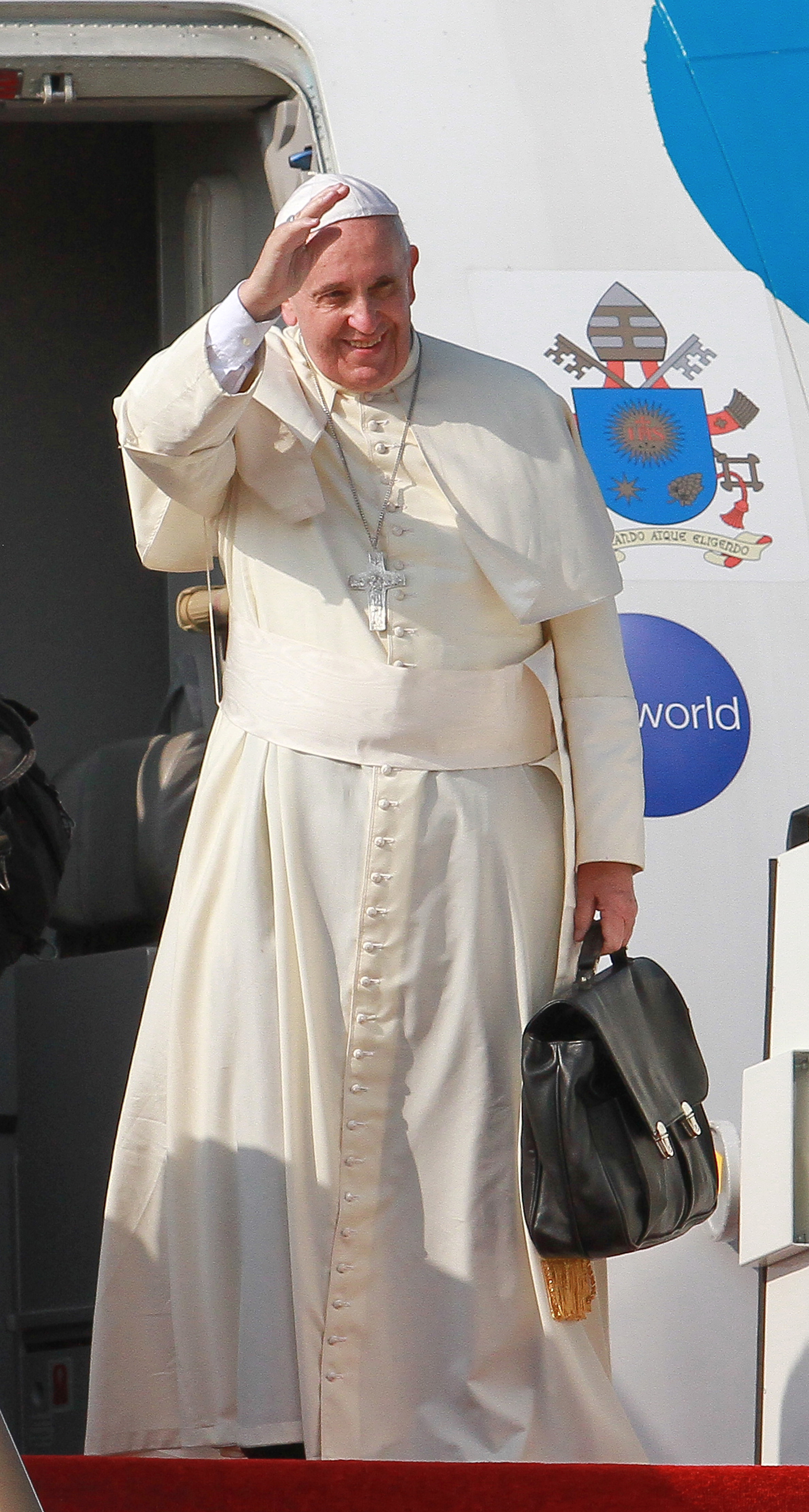 Pope Francis waves during the departure ceremony at the Bandaranaike International Airport  in Colombo, Sri Lank on Jan. 15, 2015.