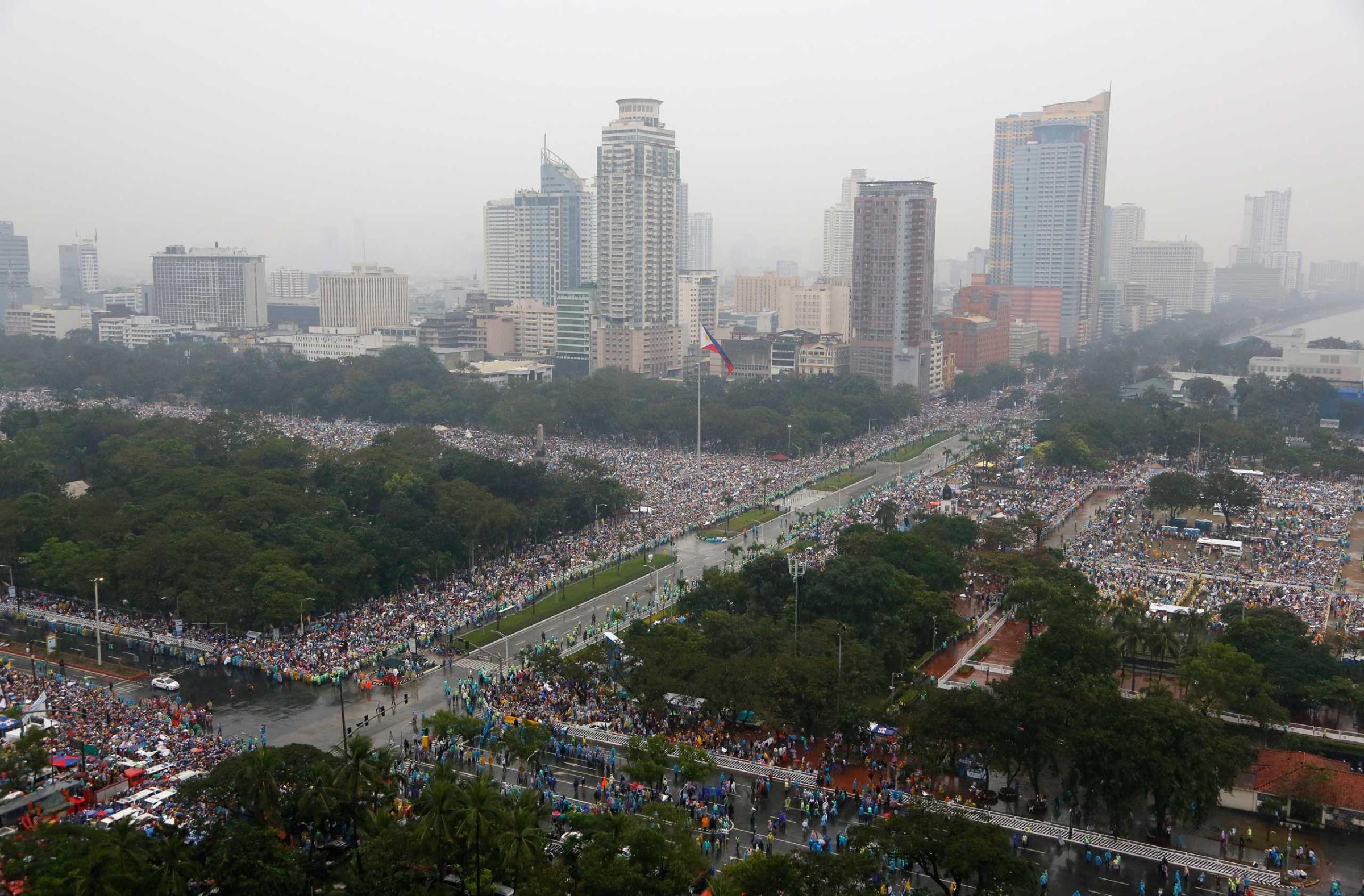 Millions of the faithful are seen in the Rizal Park area where Pope Francis celebrates Mass in Manila, Jan. 18, 2015.