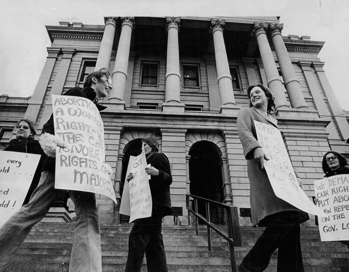 Members of the Mountain States Women's Abortion Coalition form a picket line in front of the State Capitol in January of 1972 (David Cupp—Post Archive/Getty Images)