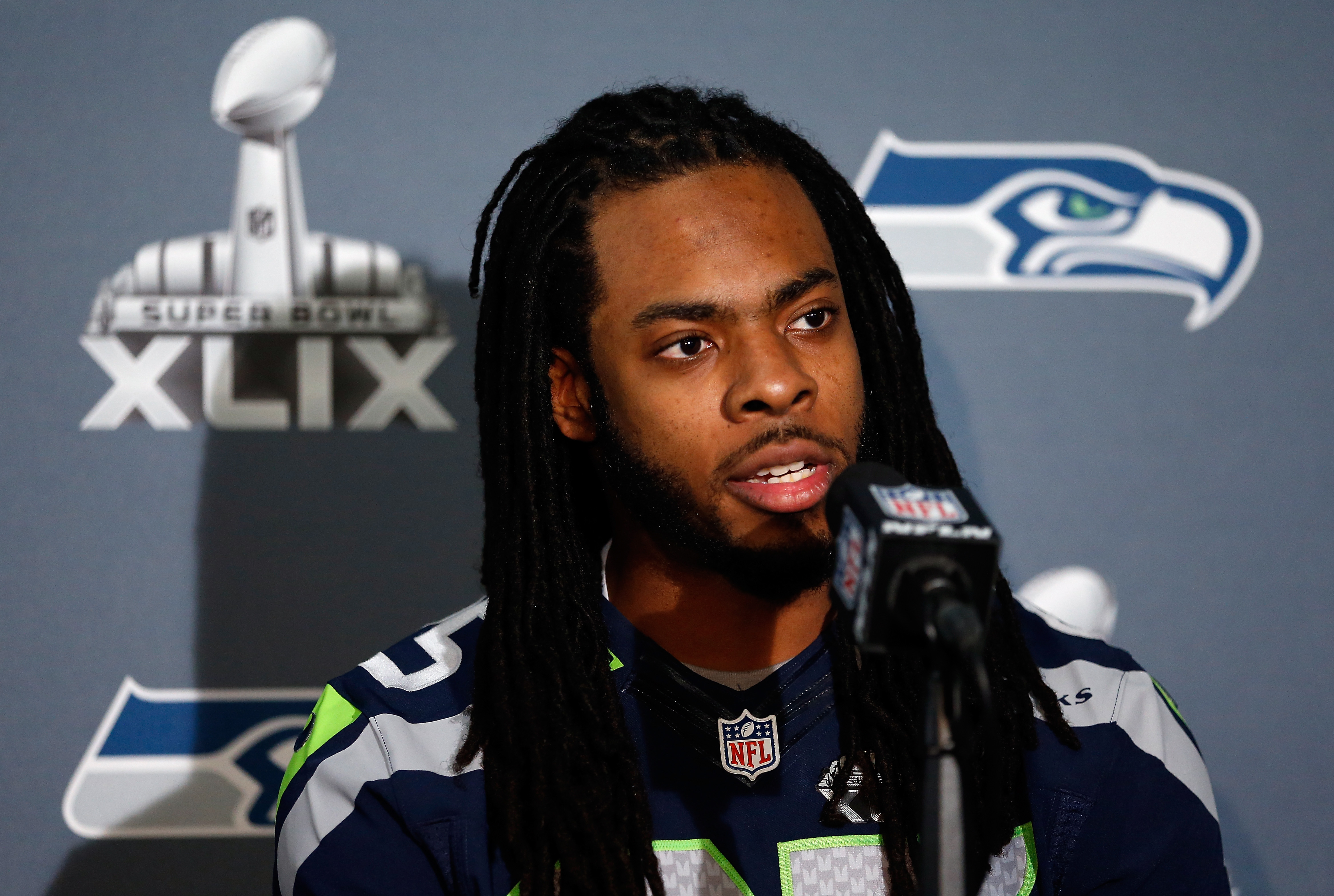 Richard Sherman of the Seattle Seahawks speaks during a Super Bowl XLIX media event on Jan. 28, 2015 in Chandler, Arizona.