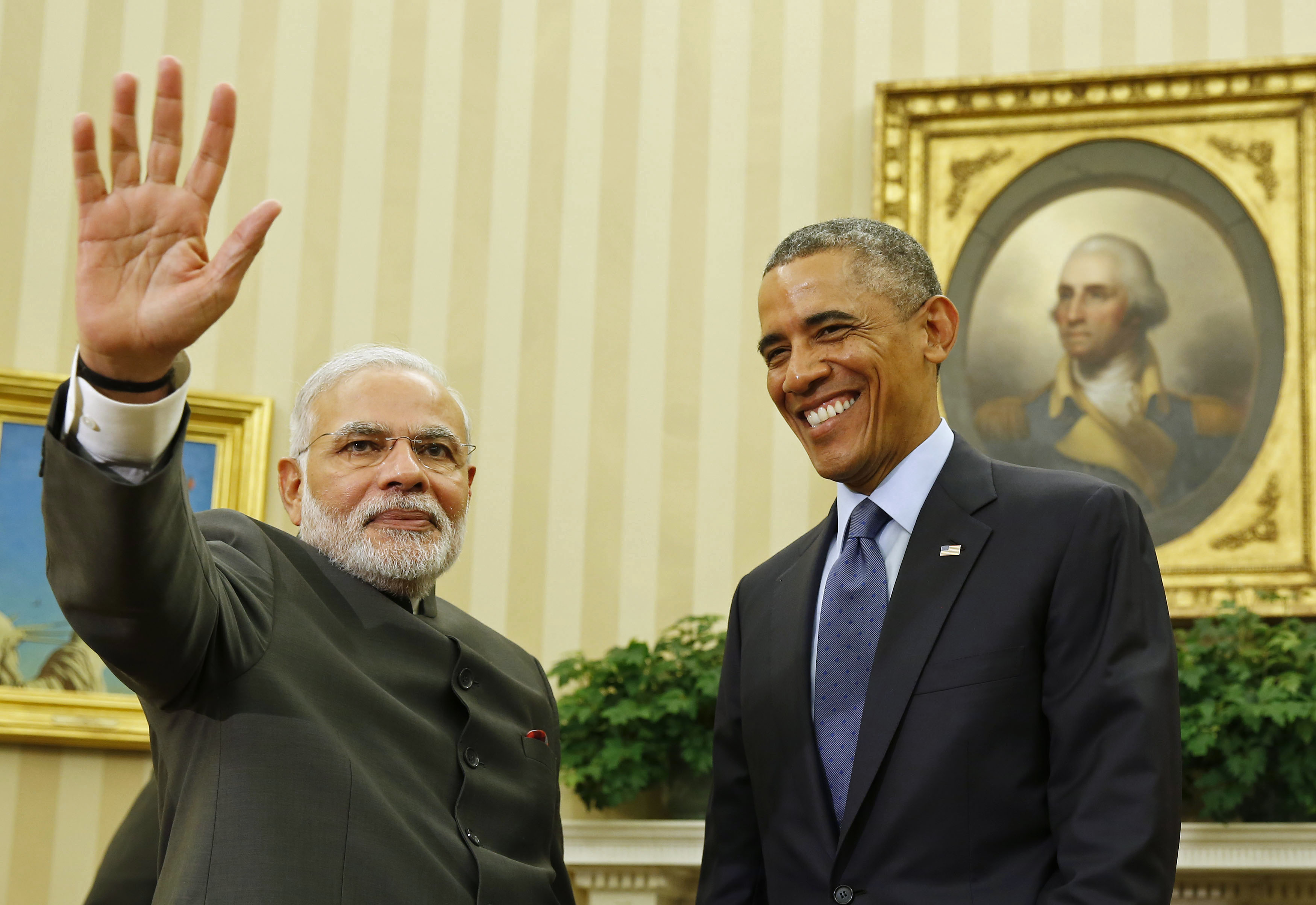 U.S. President Barack Obama smiles as he hosts a meeting with India's Prime Minister Narendra Modi in the Oval Office of the White House in Washington September 30, 2014. (Larry Downing—Reuters)