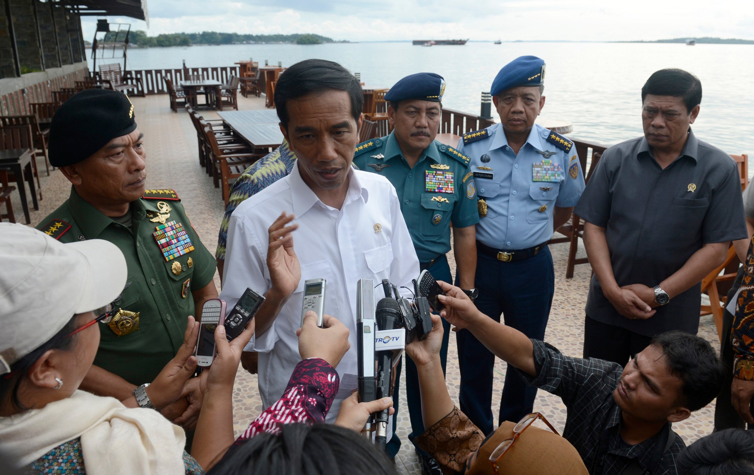 Indonesian President Joko Widodo speaks to the media about AirAsia Flight QZ8501 in Sorong, West Papua,
