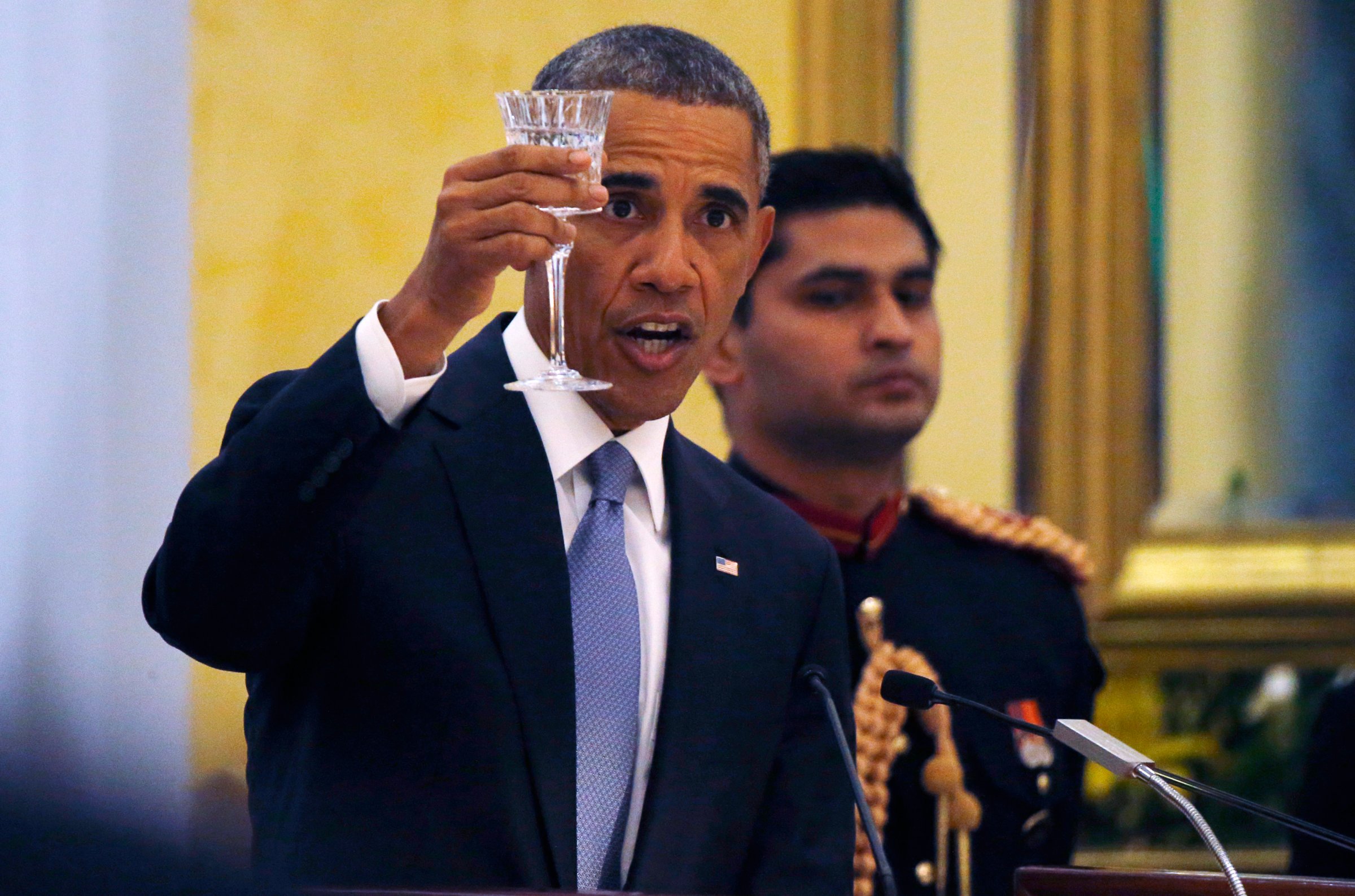 U.S. President Barack Obama delivers a toast as he attends an Official State Dinner at the Rashtrapati Bhavan presidential palace in New Delhi