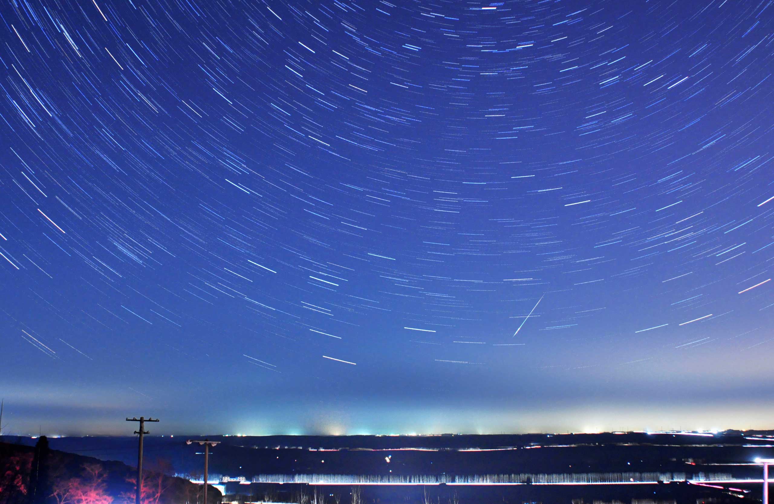 A long exposure shows the 2014 Quadrantid meteor shower, as seen in Qingdao, Shandong province, China, Jan. 4, 2014. (Reuters)