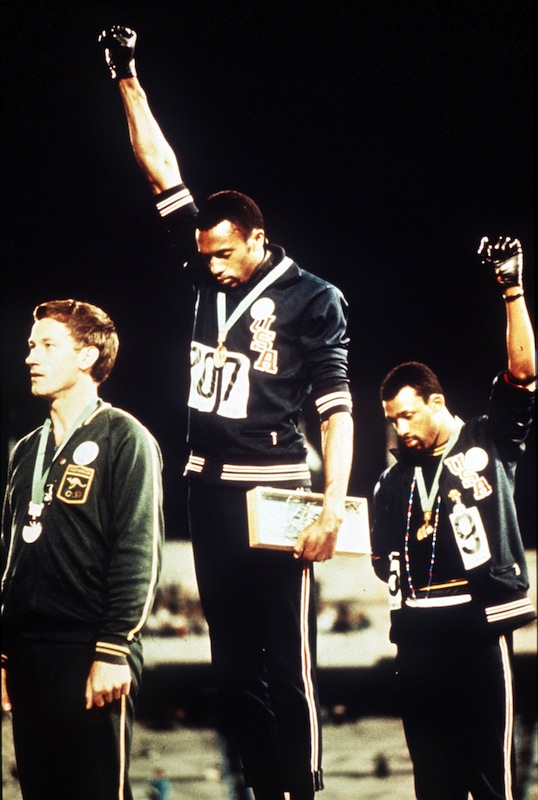Tommie Smith (C) and John Carlos