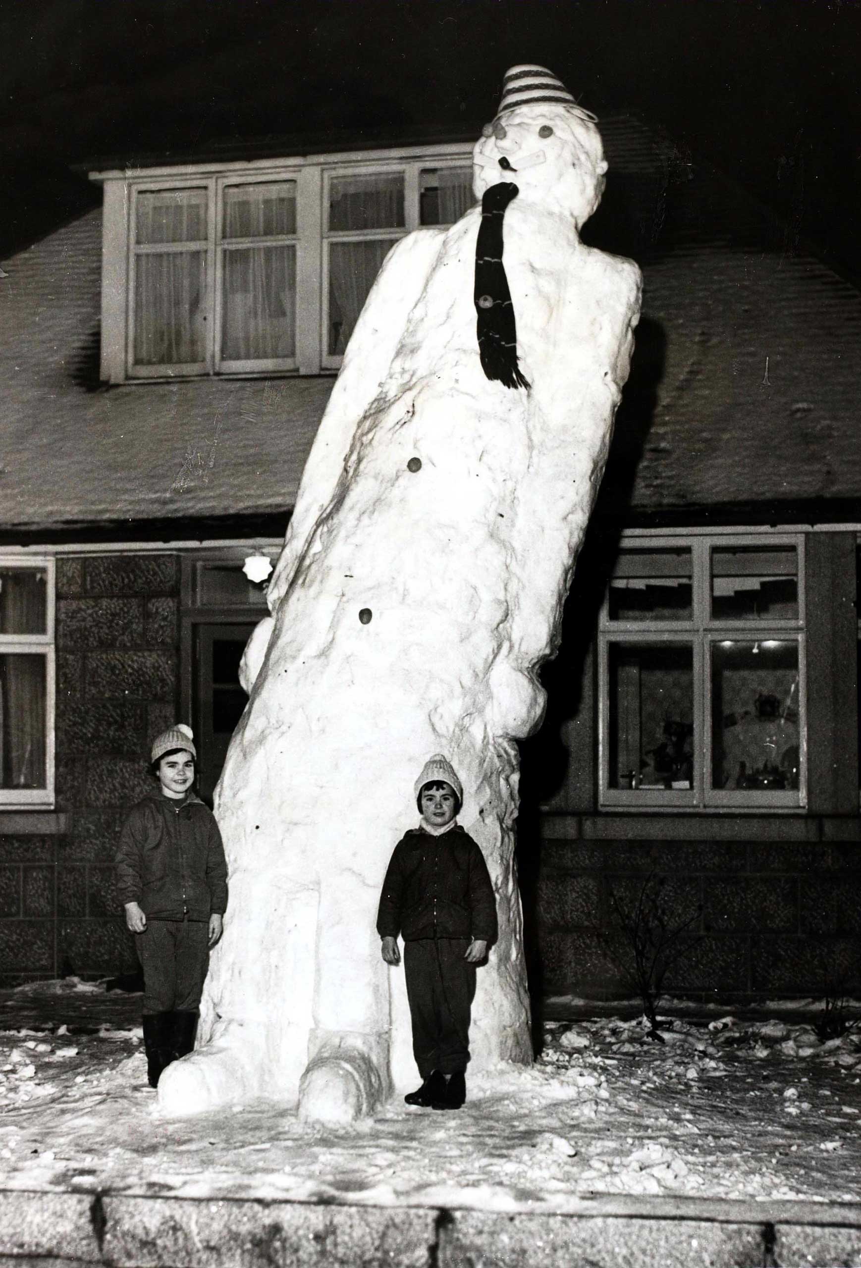 Popperfoto,The Book, Volume 1,Page: 100, Picture: 1, Giant snowman measuring seventeen feet made by two girls at Aberdeen, Scotland, 3rd January 1963