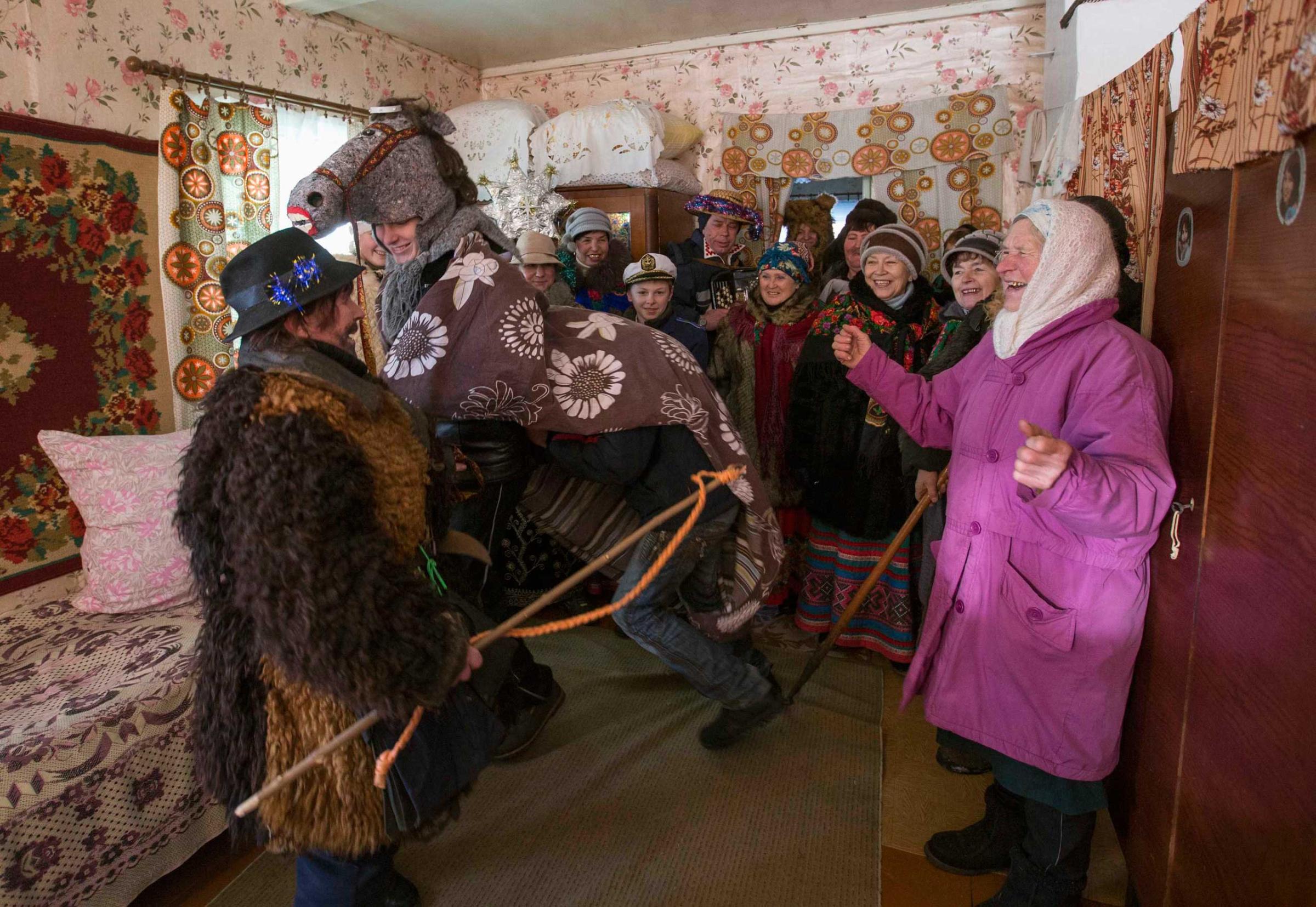 People celebrate the pagan rite called "Kolyadki" in the village of Osovo