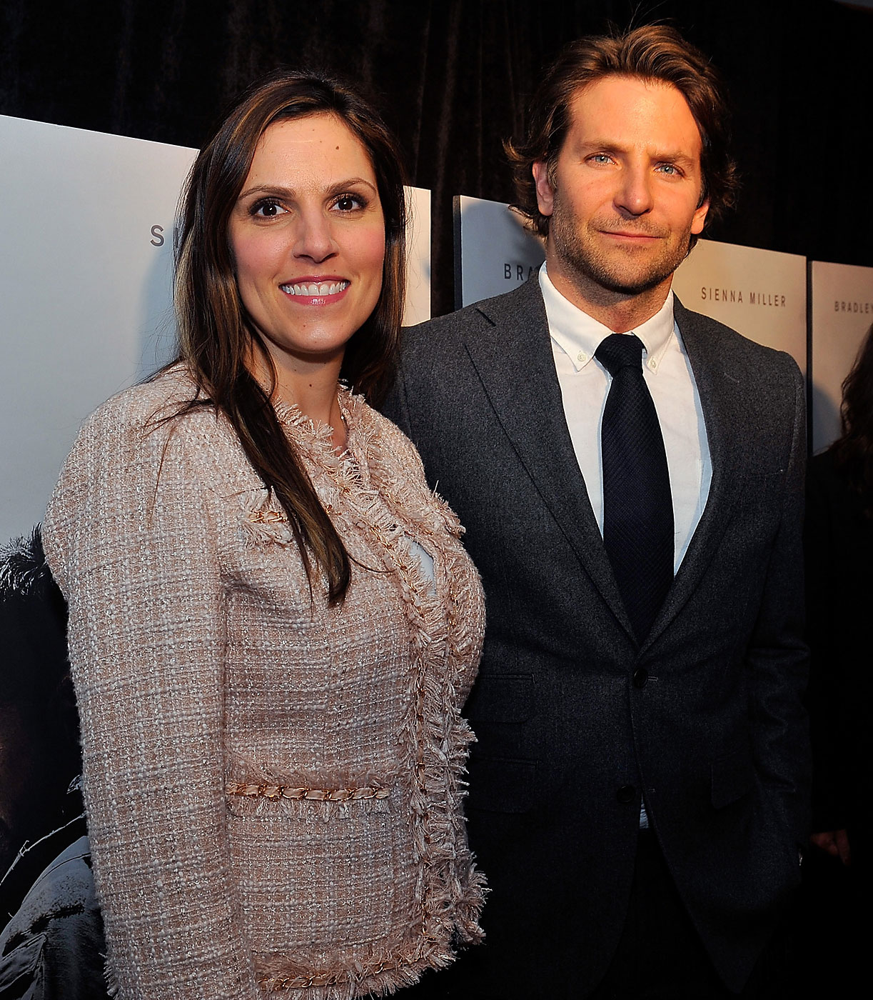 Taya Kyle, left, and Bradley Cooper attend the opening of <i>American Sniper</i> at the Burke Theater at the U.S. Navy Memorial on Jan. 13, 2015 in Washington, DC. (Larry French—Getty Images)