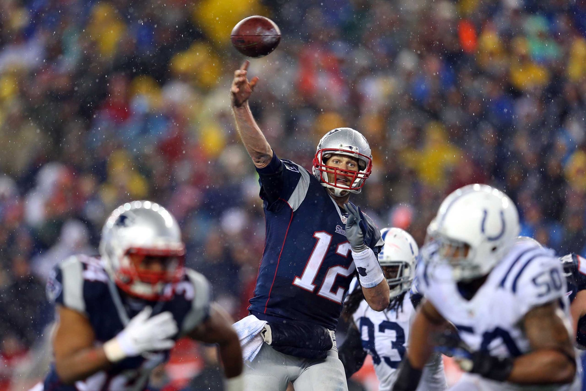 Tom Brady of the New England Patriots throws a touchdown pass against the Indianapolis Colts during the 2015 AFC Championship Game on Jan. 18, 2015 in Foxboro, Mass.