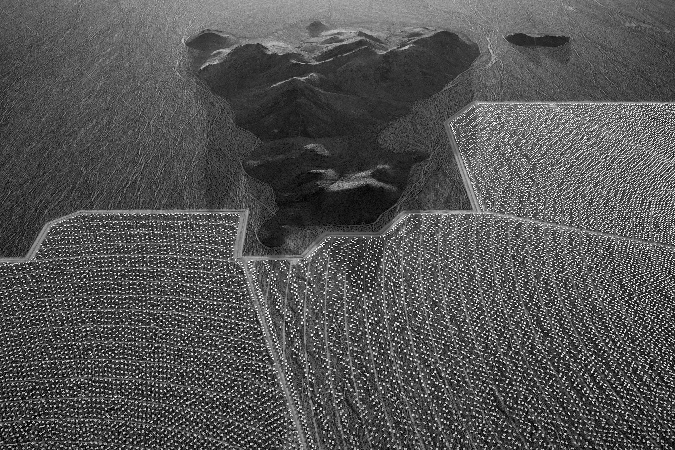 Mirrored heliostats dot the landscape at the Ivanpah solar plant in the Mojave Desert, California.