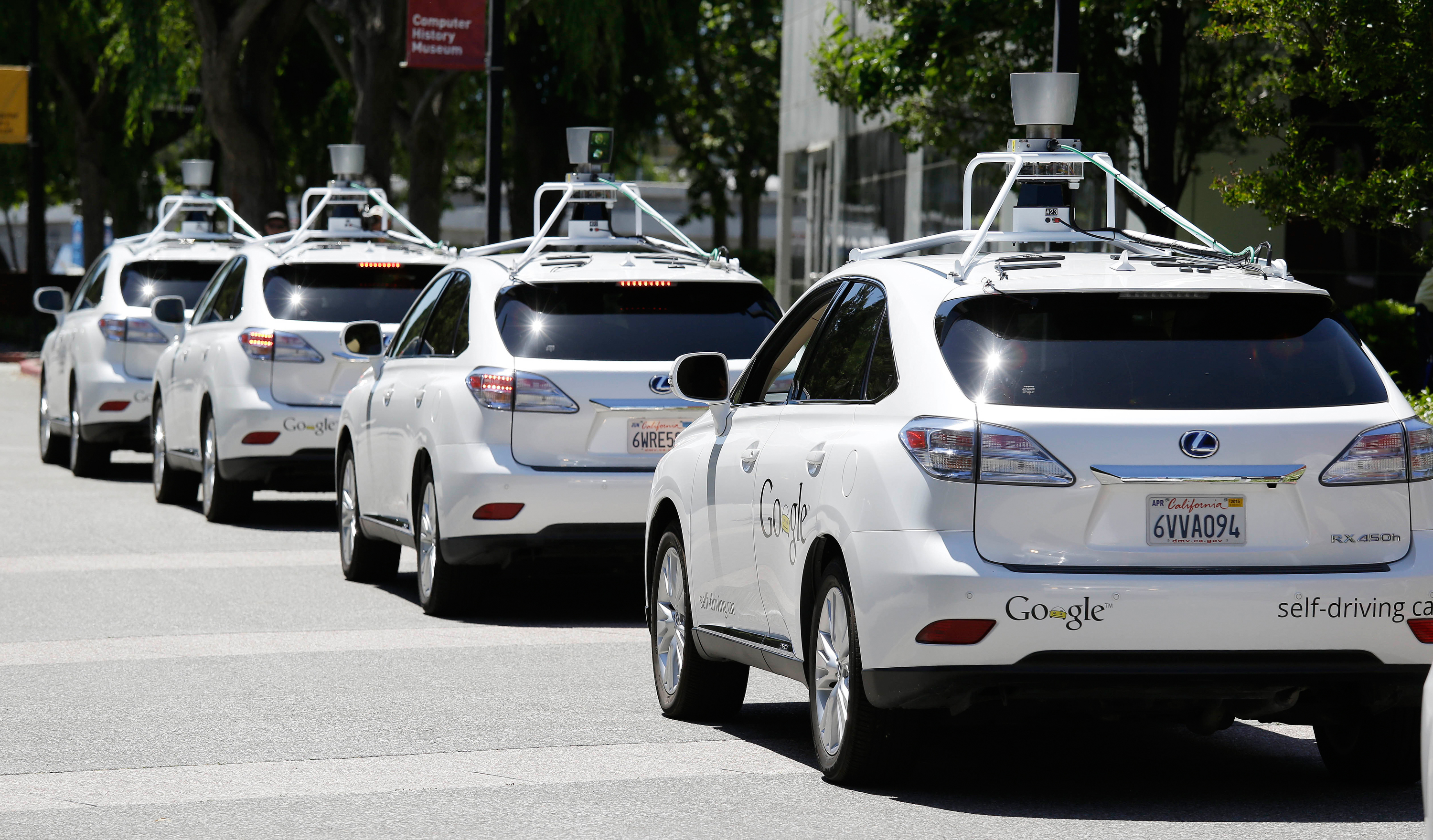 A row of Google self-driving cars in Mountain View, California (Eric Risberg&mdash;AP)