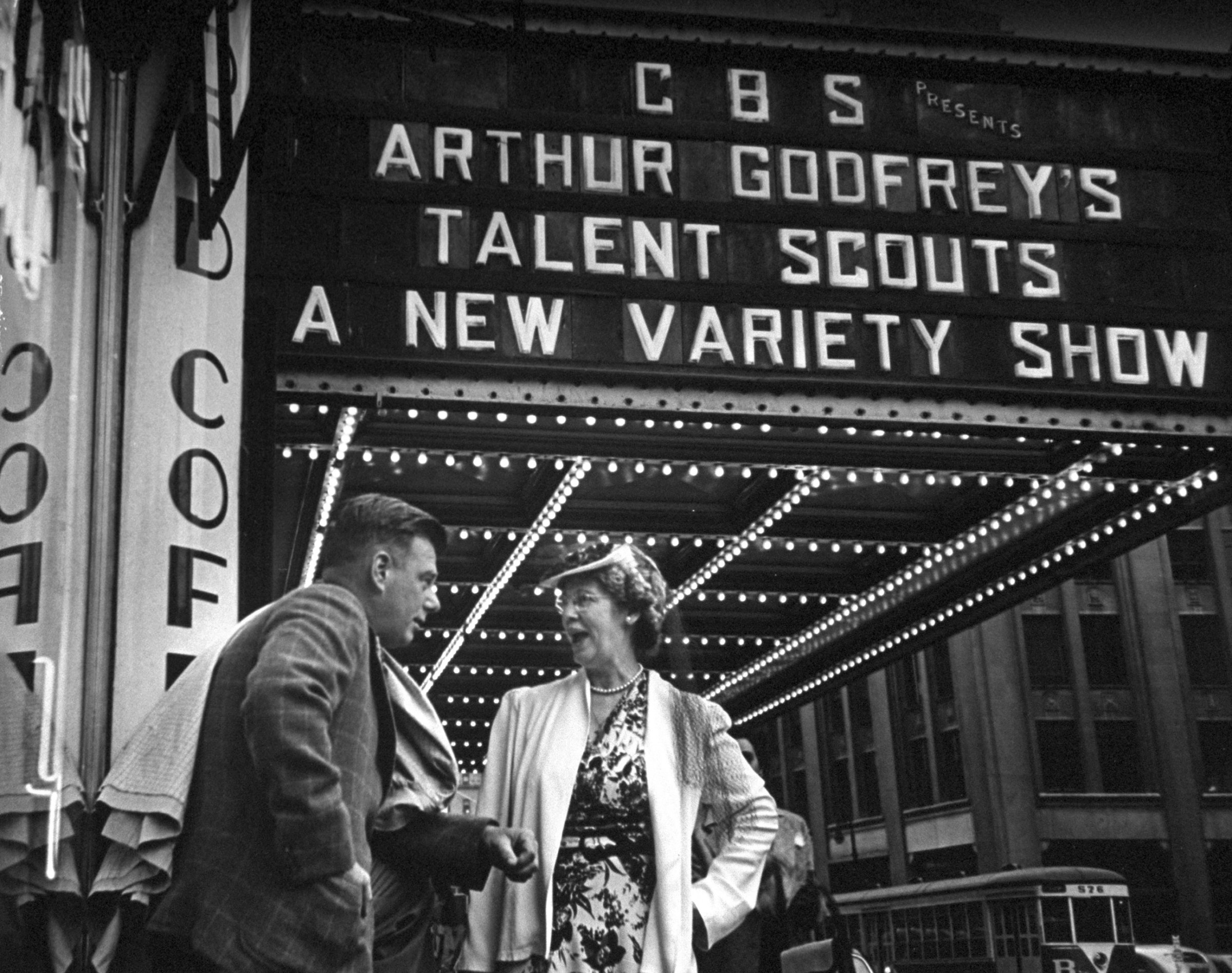Arthur Godfrey talking to mother of girl who appeared on Godfrey's radio program, 1946.