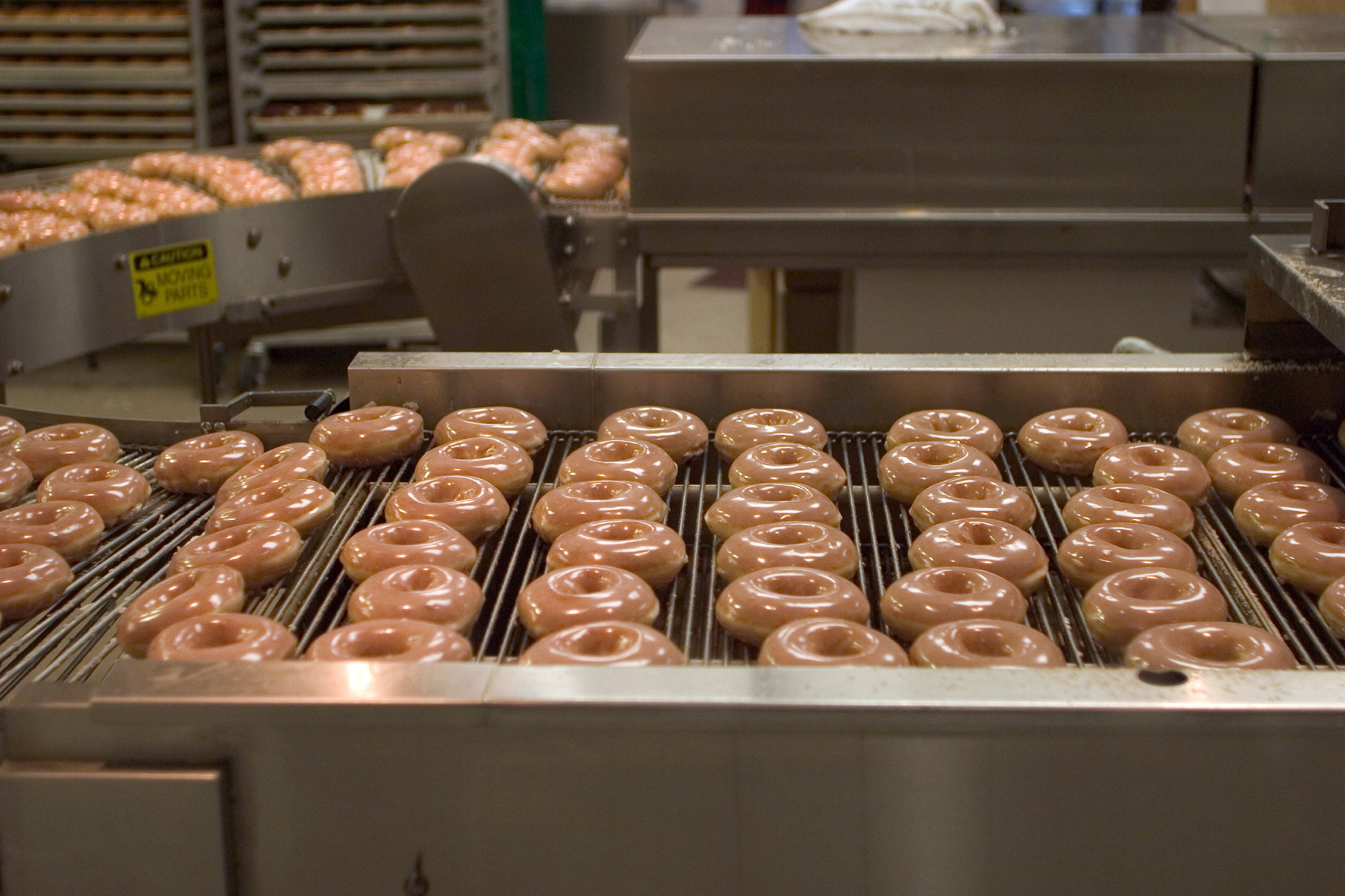 Krispy Kreme donut production line (Lightworks Media—Alamy)