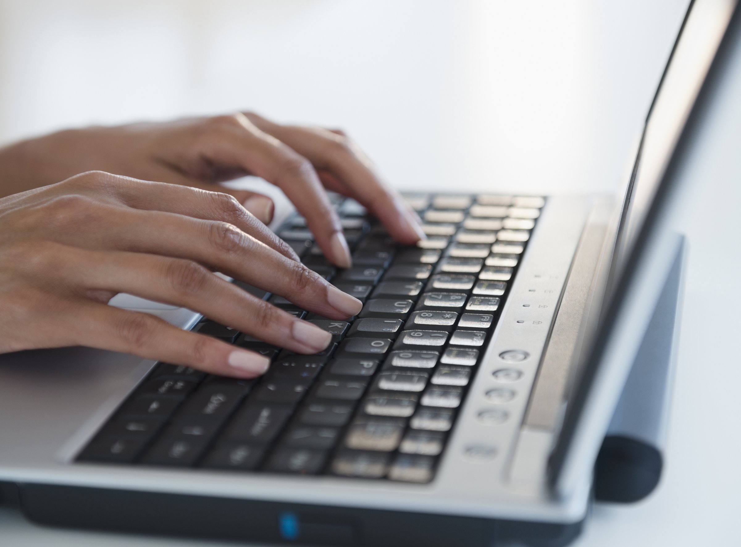 woman-typing-laptop