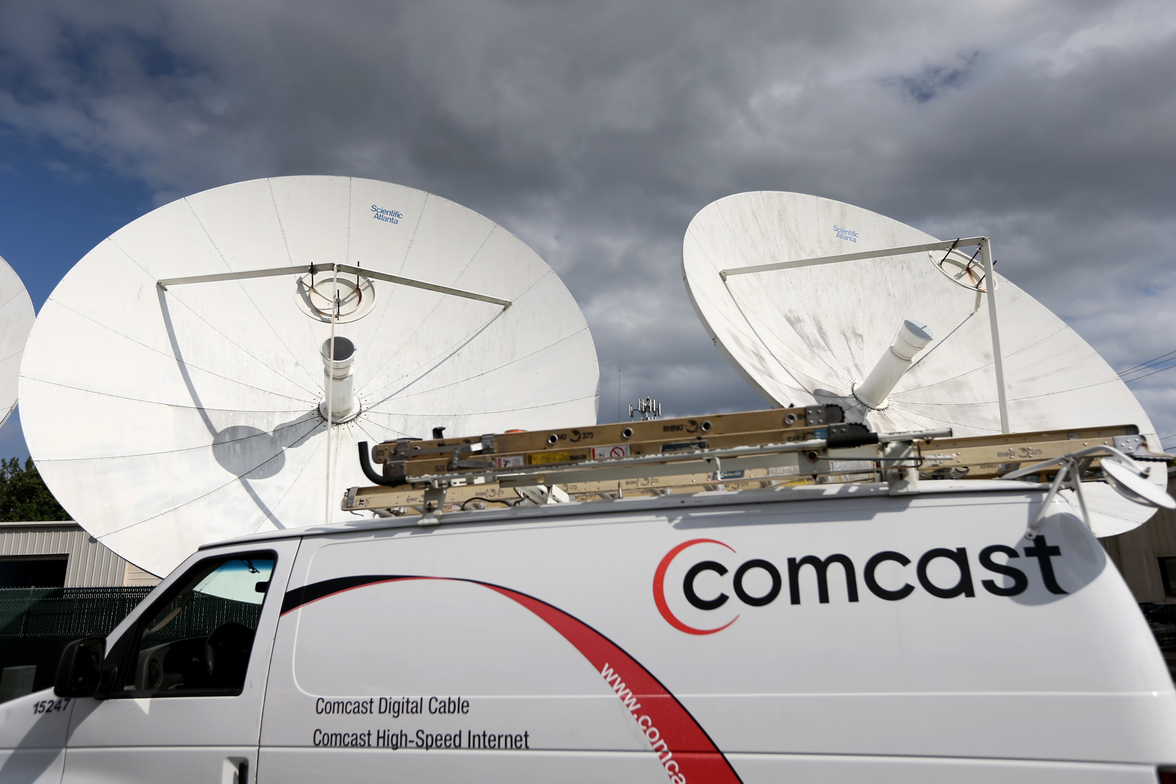 A Comcast truck is seen parked at one of their centers on February 13, 2014 in Pompano Beach, Florida. (Joe Raedle—Getty Images)