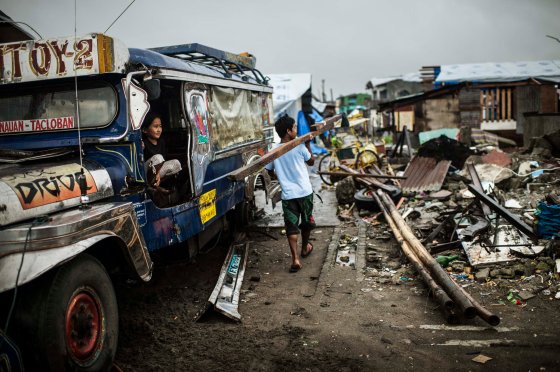 Jan. 13, 2014: The cleaning up of the debris and destruction near Palo, outside of Tacloban, more than two months after Typhoon Haiyan.