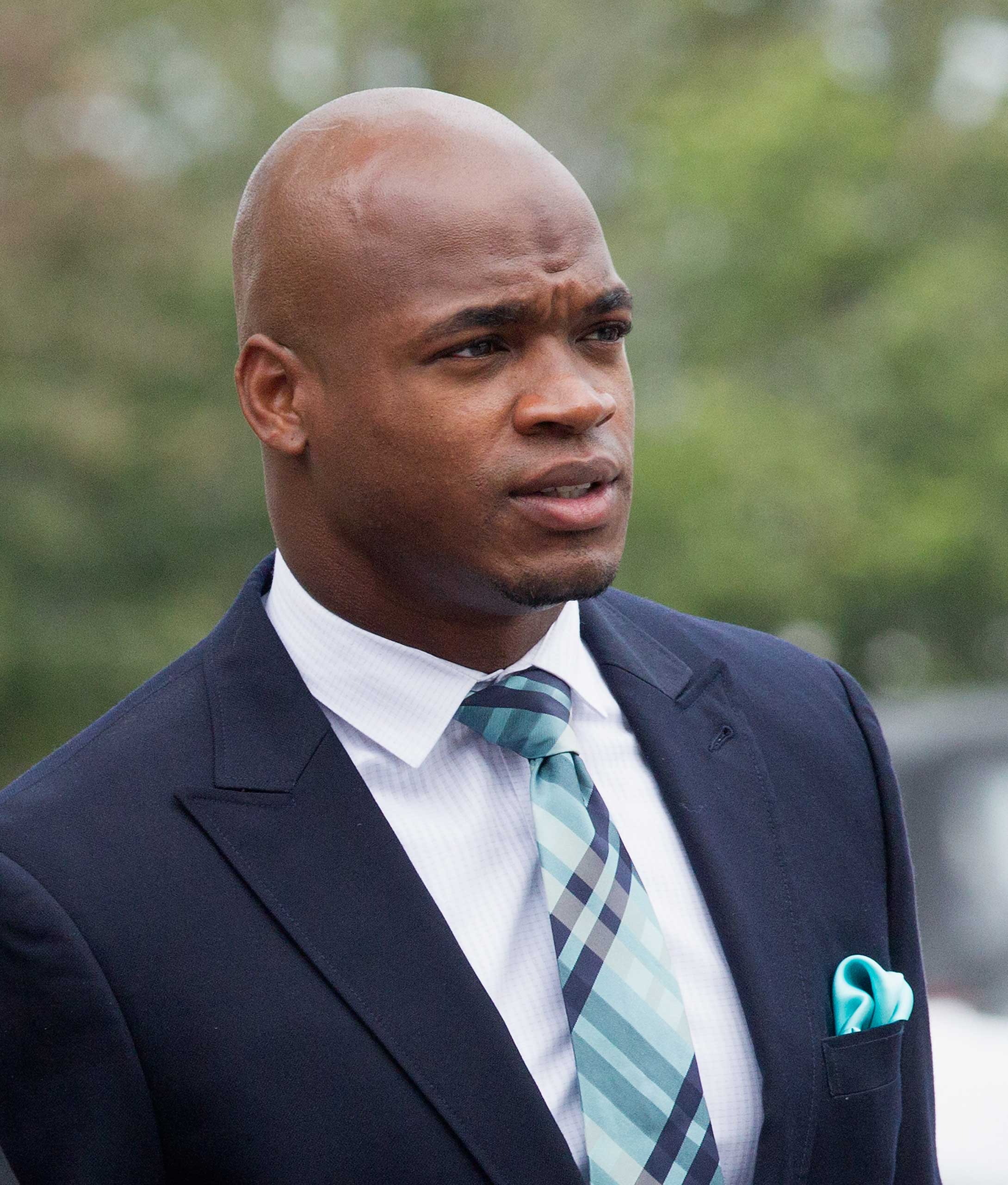 Adrian Peterson of the Minnesota Vikings arrives for a court hearing on charges of child abuse at the Montgomery County Courthouse on Nov. 4, 2014 in Conroe, Texas.