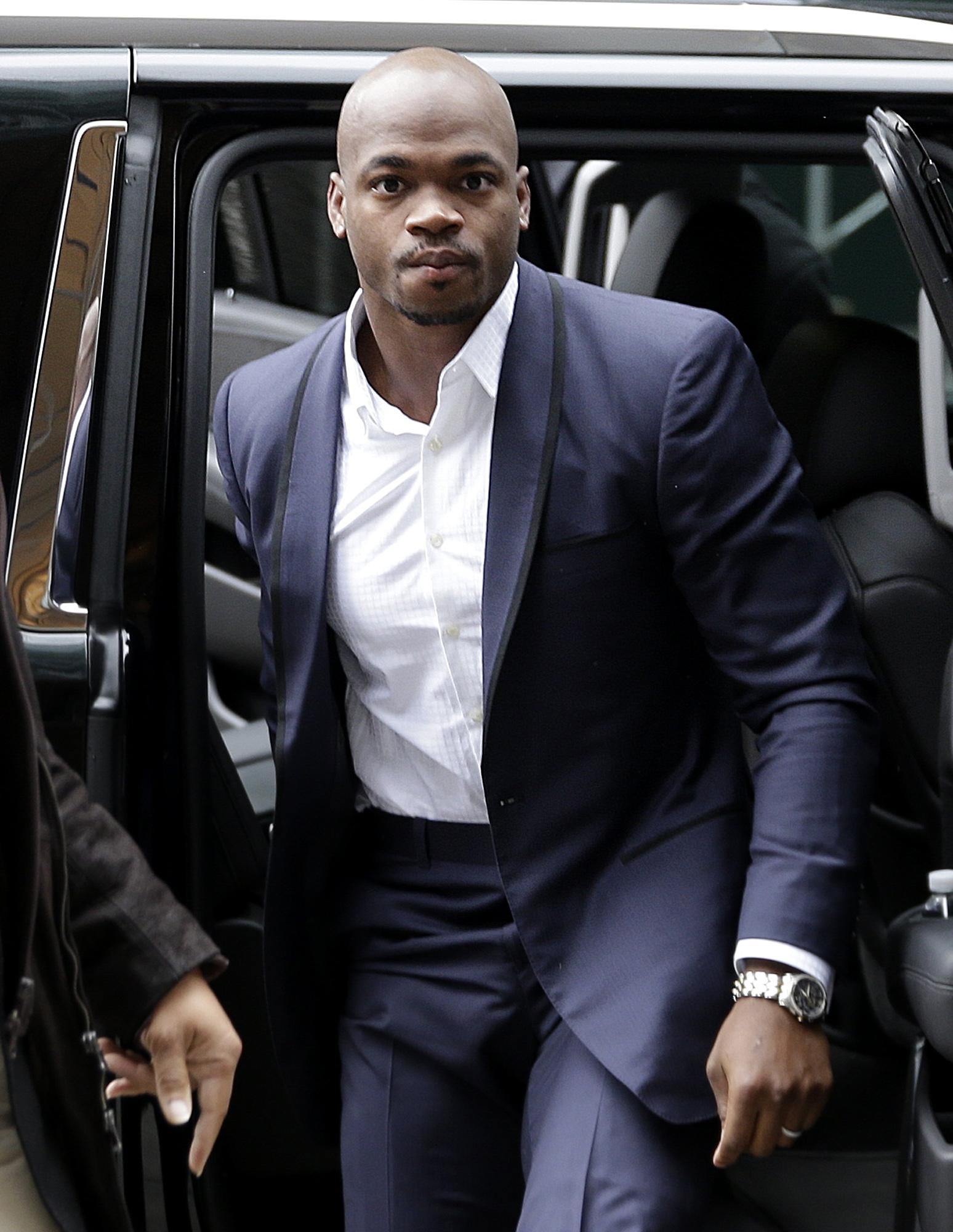 Minnesota Vikings' Adrian Peterson arrives for a hearing for the appeal of his suspension in New York on Dec. 2, 2014.