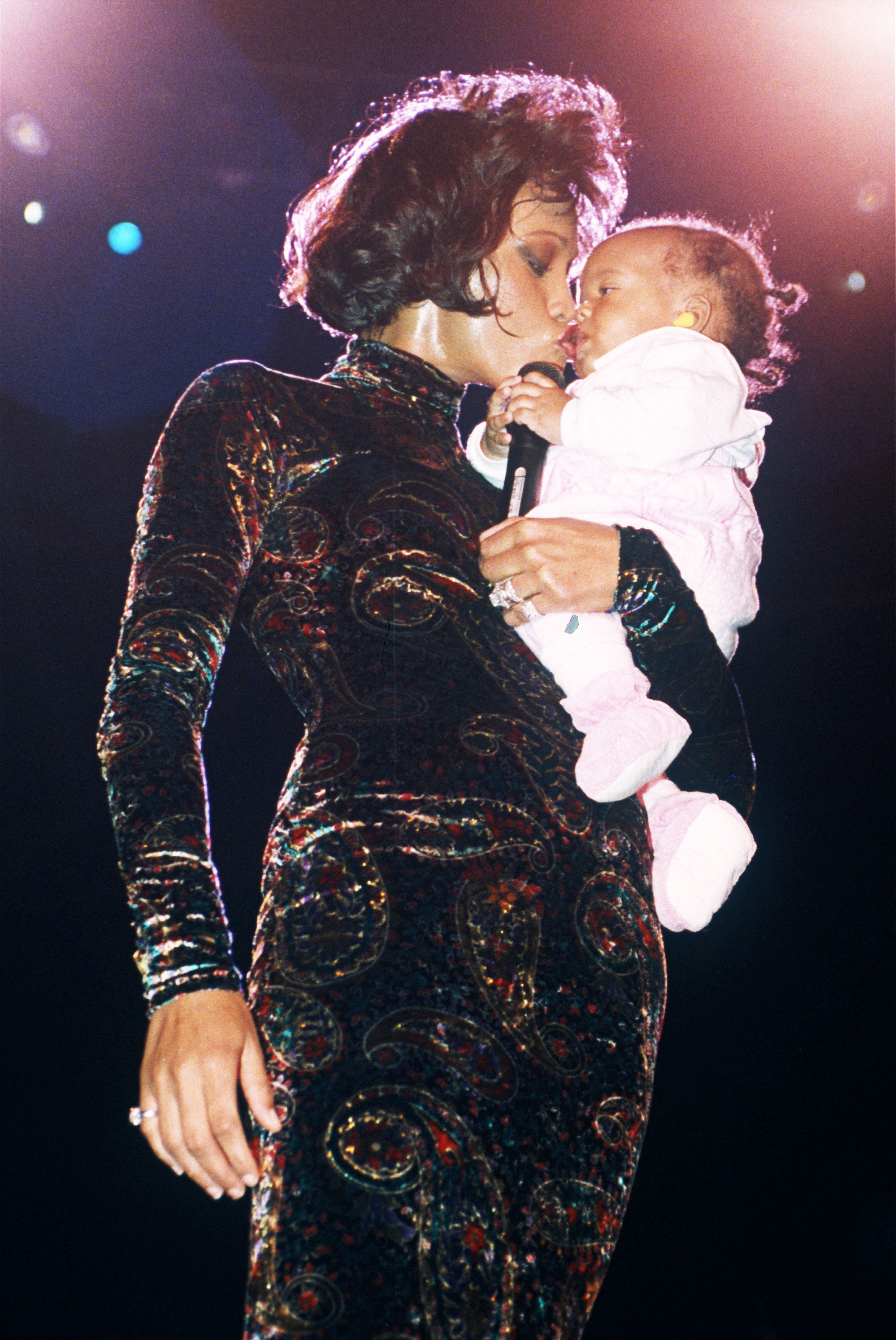 Whitney Houston holds her daughter Bobbi Kristina Brown on June 15, 1993.