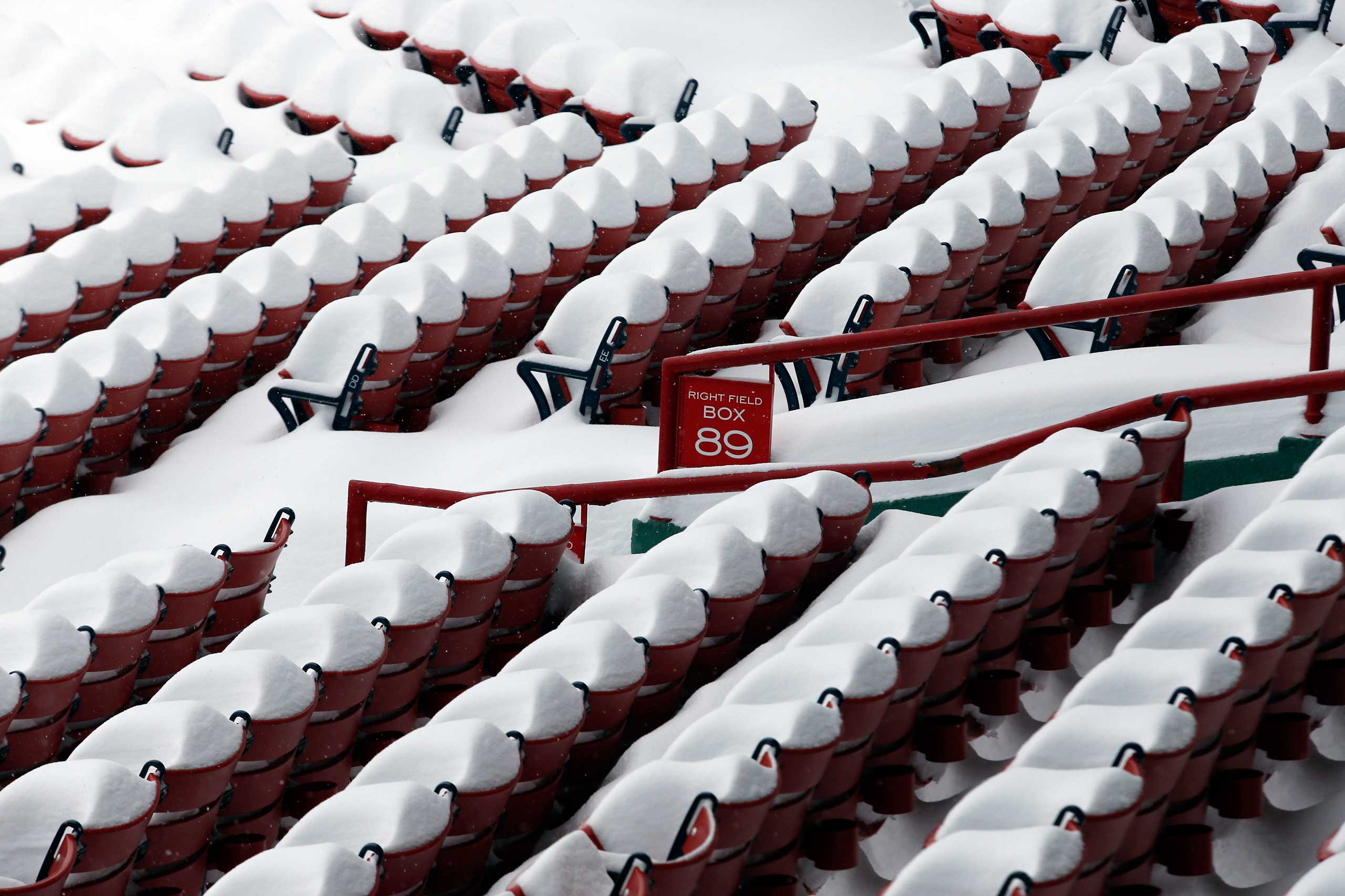 Snow fills the seats at Fenway Park in Boston on Feb. 9, 2015.