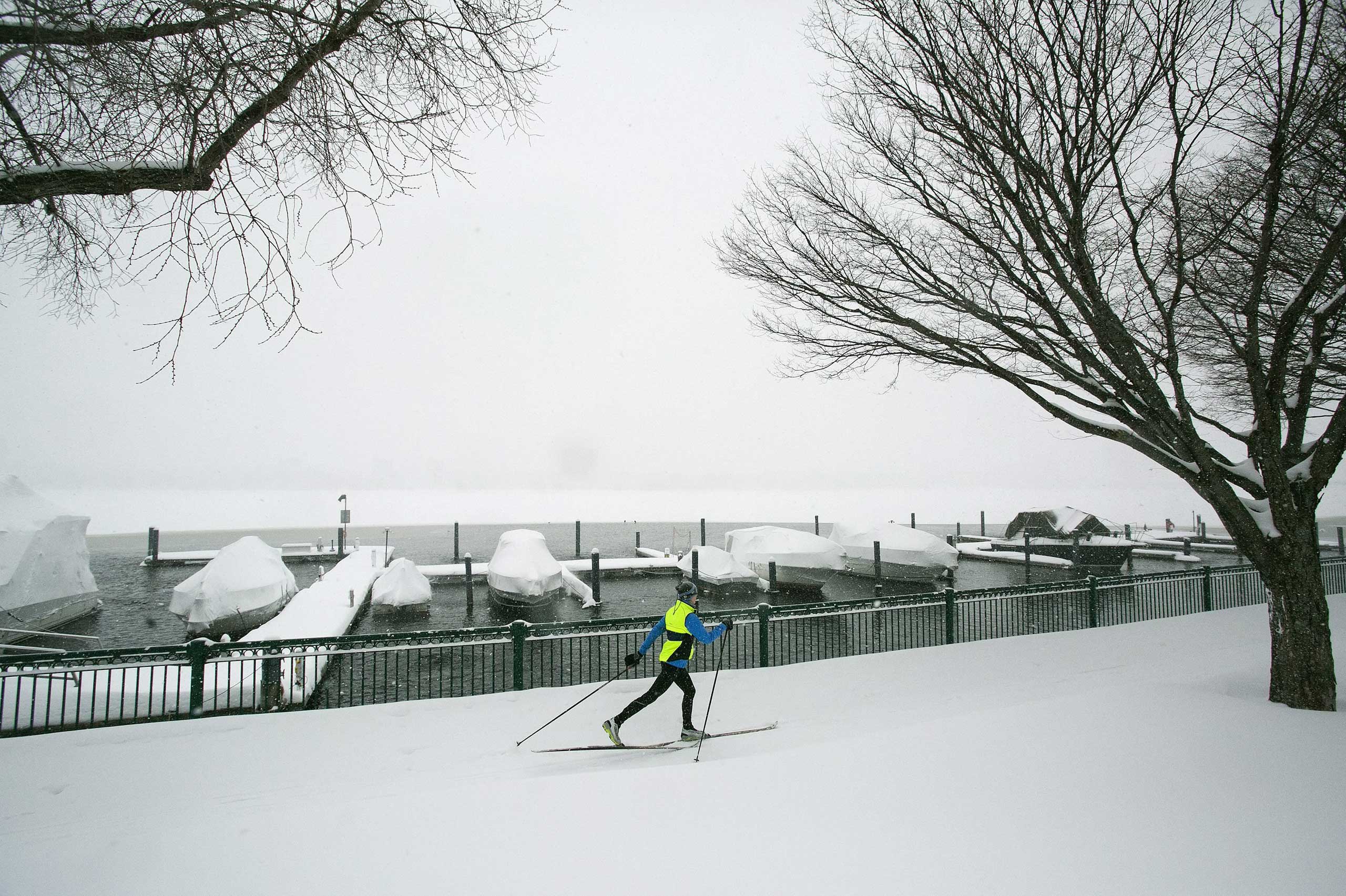 A cross-country skier goes up a path near the Charles River in Cambridge, Mass. on Feb. 9, 2015.