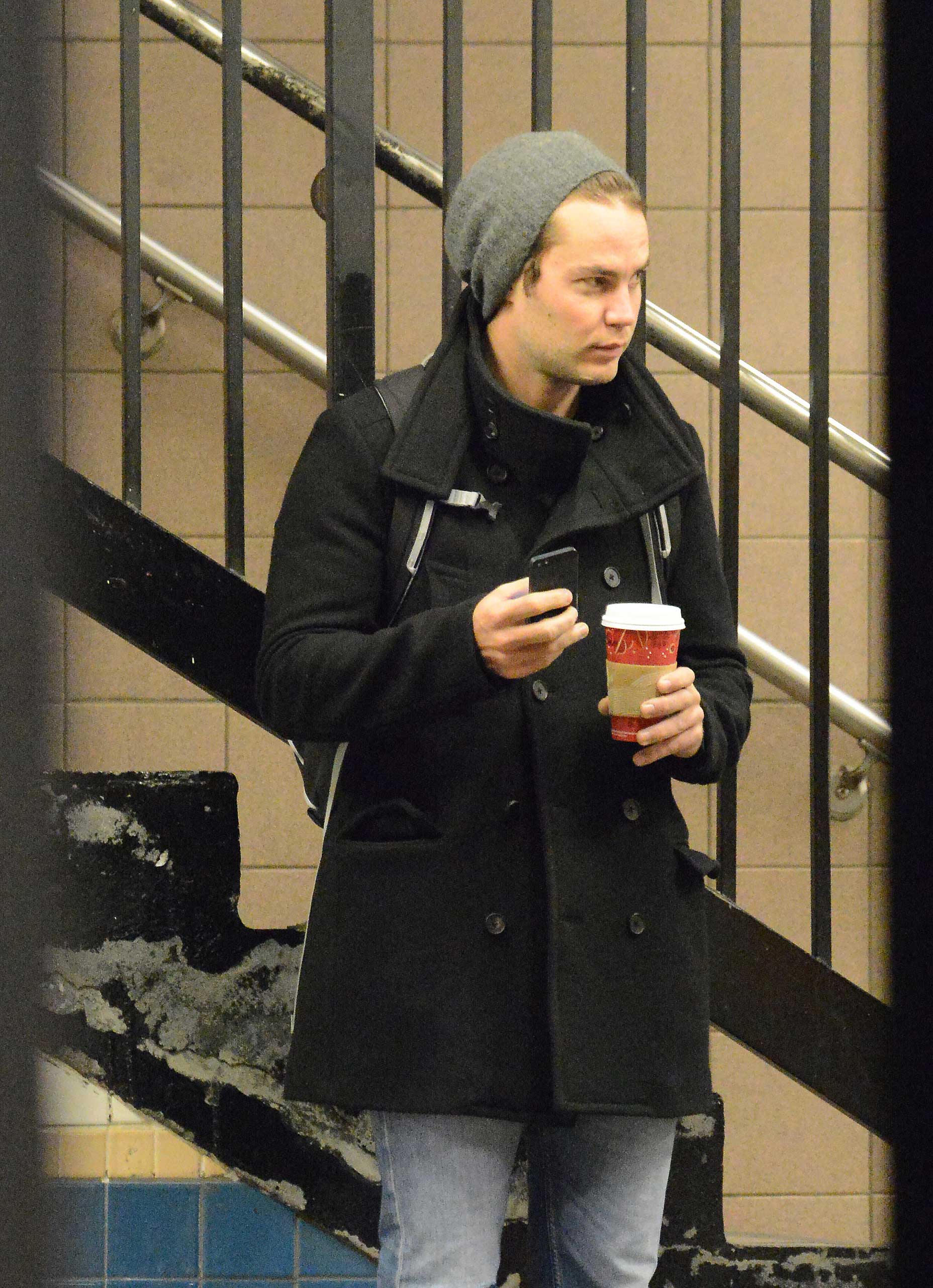 Taylor Kitsch takes the subway in NYC