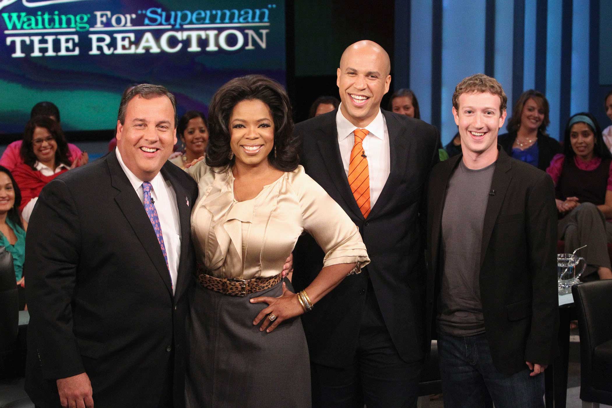 Talk-show host Oprah Winfrey poses with New Jersey Gov. Chris Christie, Newark, N.J., Mayor Cory Booker and Mark Zuckerberg, founder of Facebook, during a live broadcast of "The Oprah Winfrey Show" on Sept. 24, 2010, in Chicago.