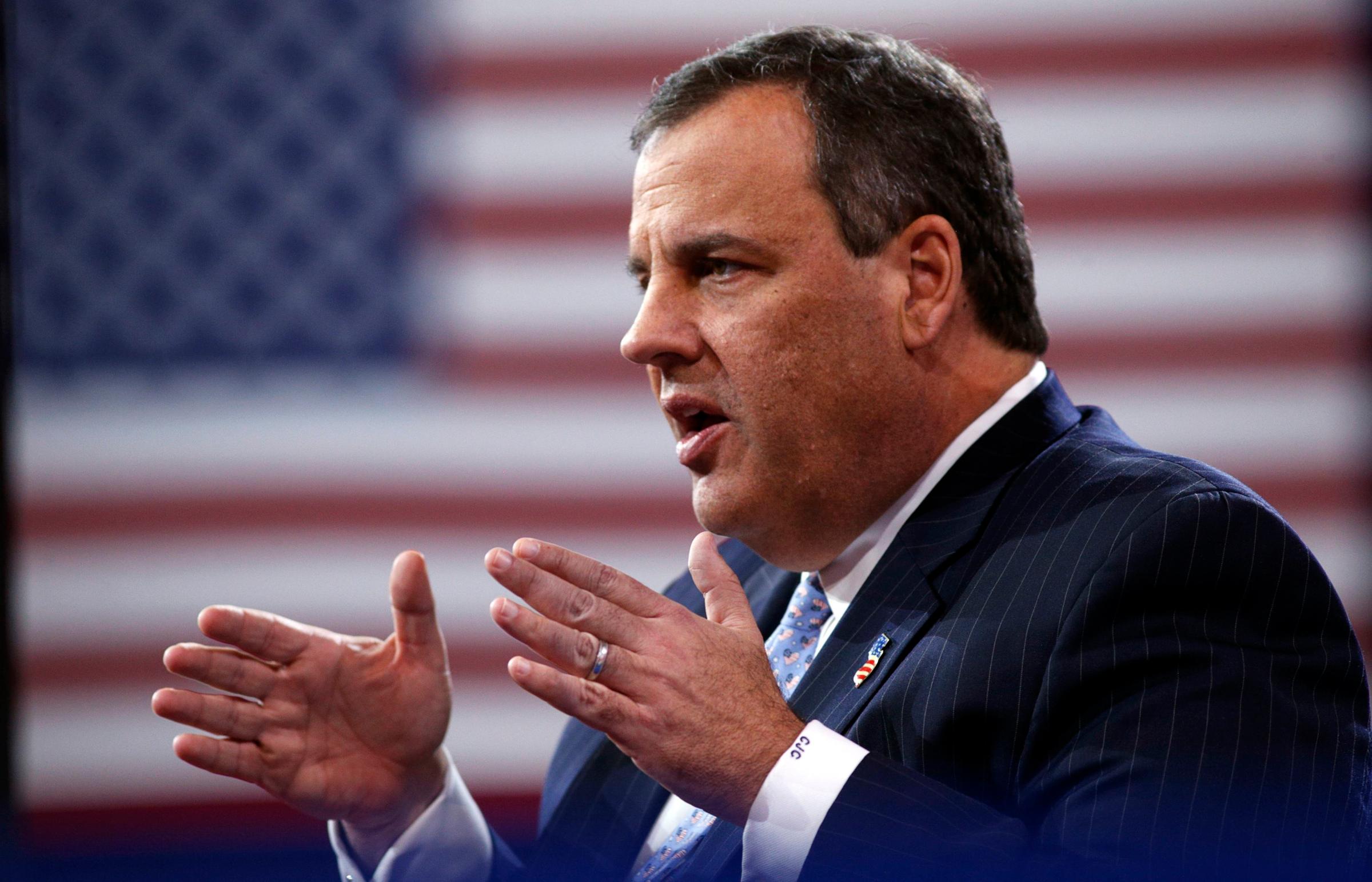 New Jersey Governor Christie speaks while being interviewed onstage at the Conservative Political Action Conference (CPAC) at National Harbor in Maryland