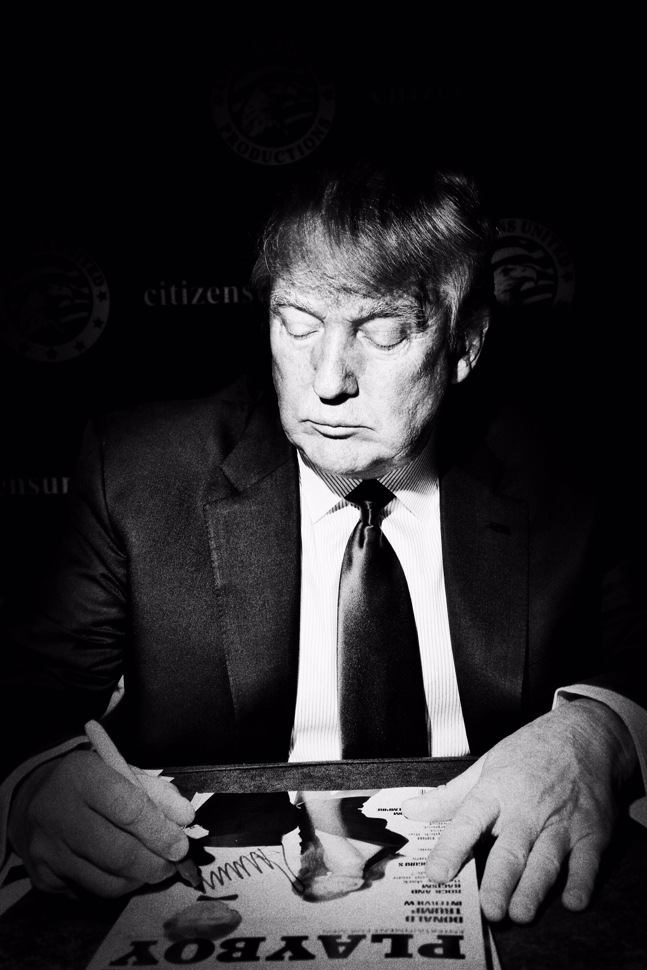 Donald Trump signs a Playboy magazine at CPAC in National Harbor, Md. on Feb. 27, 2015.