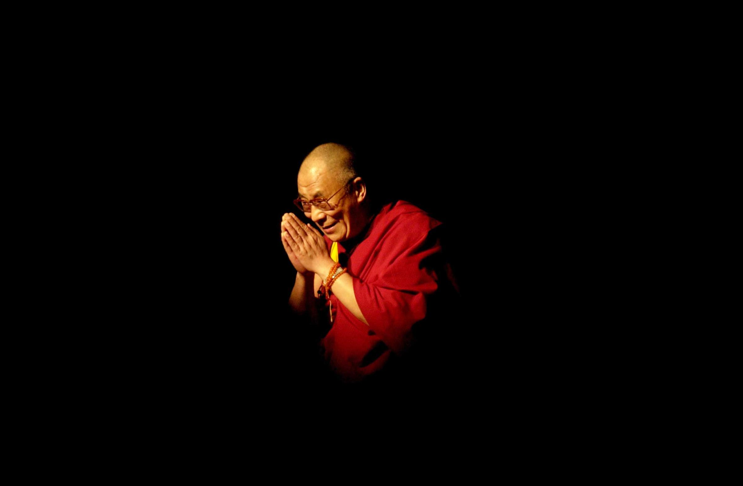 His Holiness the 14th Dalai Lama, appears at the University of California Los Angeles to give a public teaching in Los Angeles, May 2001.