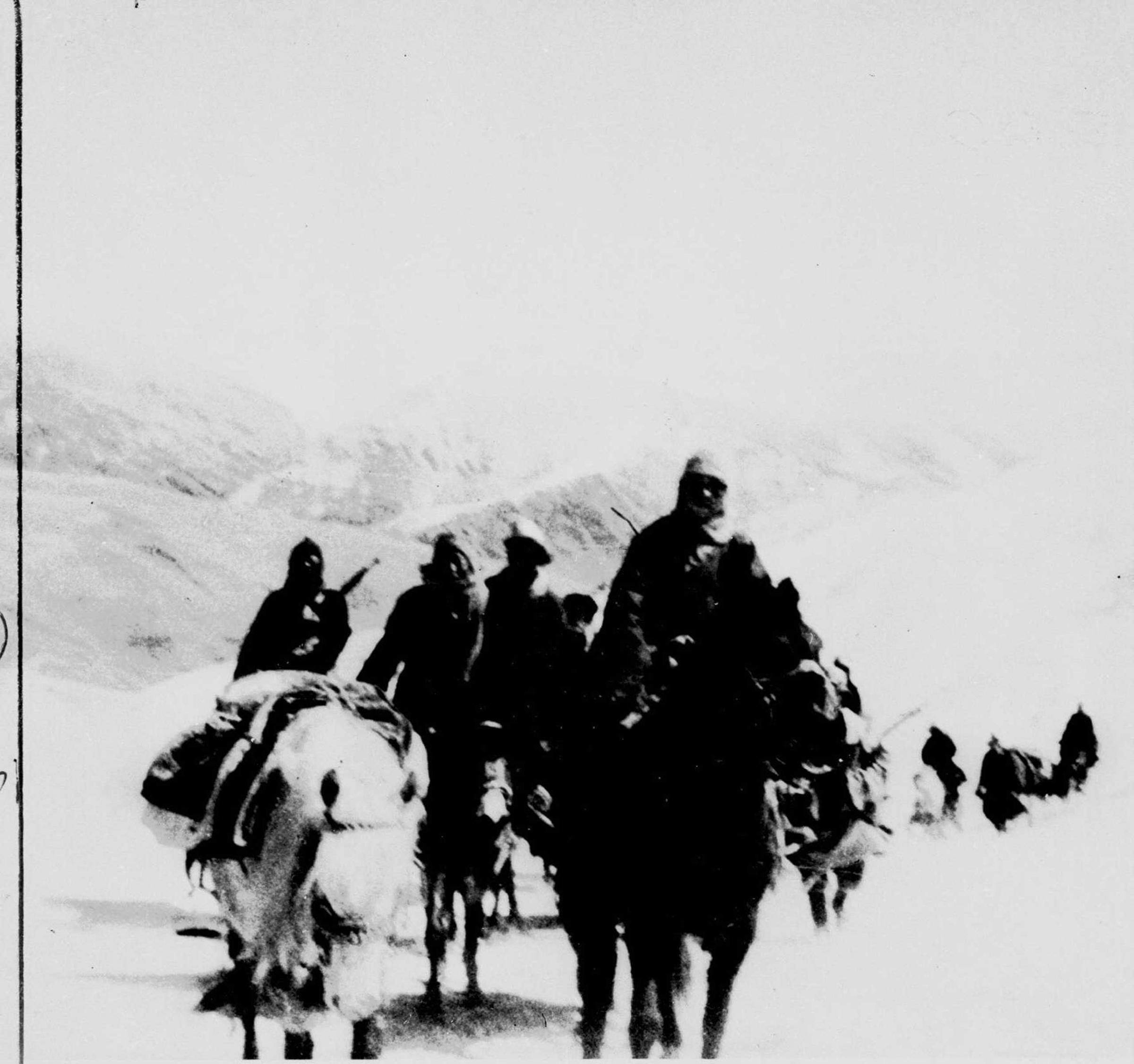 Averaging 12 miles a day through the Himalayas, the Dalai Lama is shown journeying through the Karpo Pass, one of the highest on the flight route of the 23-year-old ruler from Lhasa. His flight began March 17, 1959. Here the escape party is seen on March 28, three days before reaching sanctuary in the free zone of India.