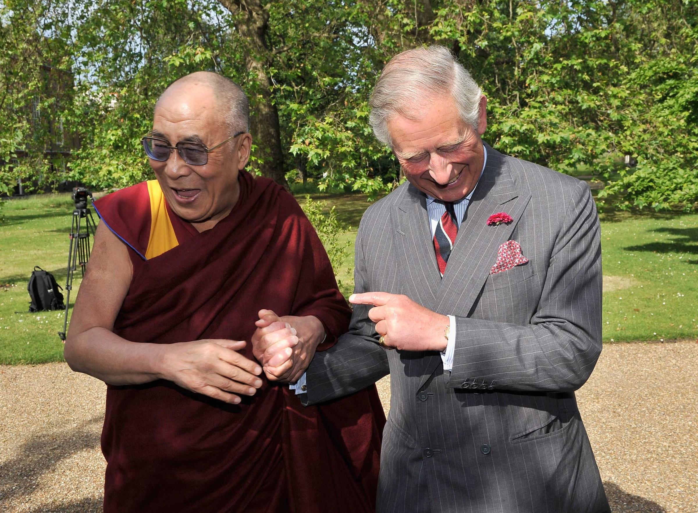 Prince Charles, Prince of Wales receives His Holiness the Dalai Lama at Clarence House in London, June 2012.