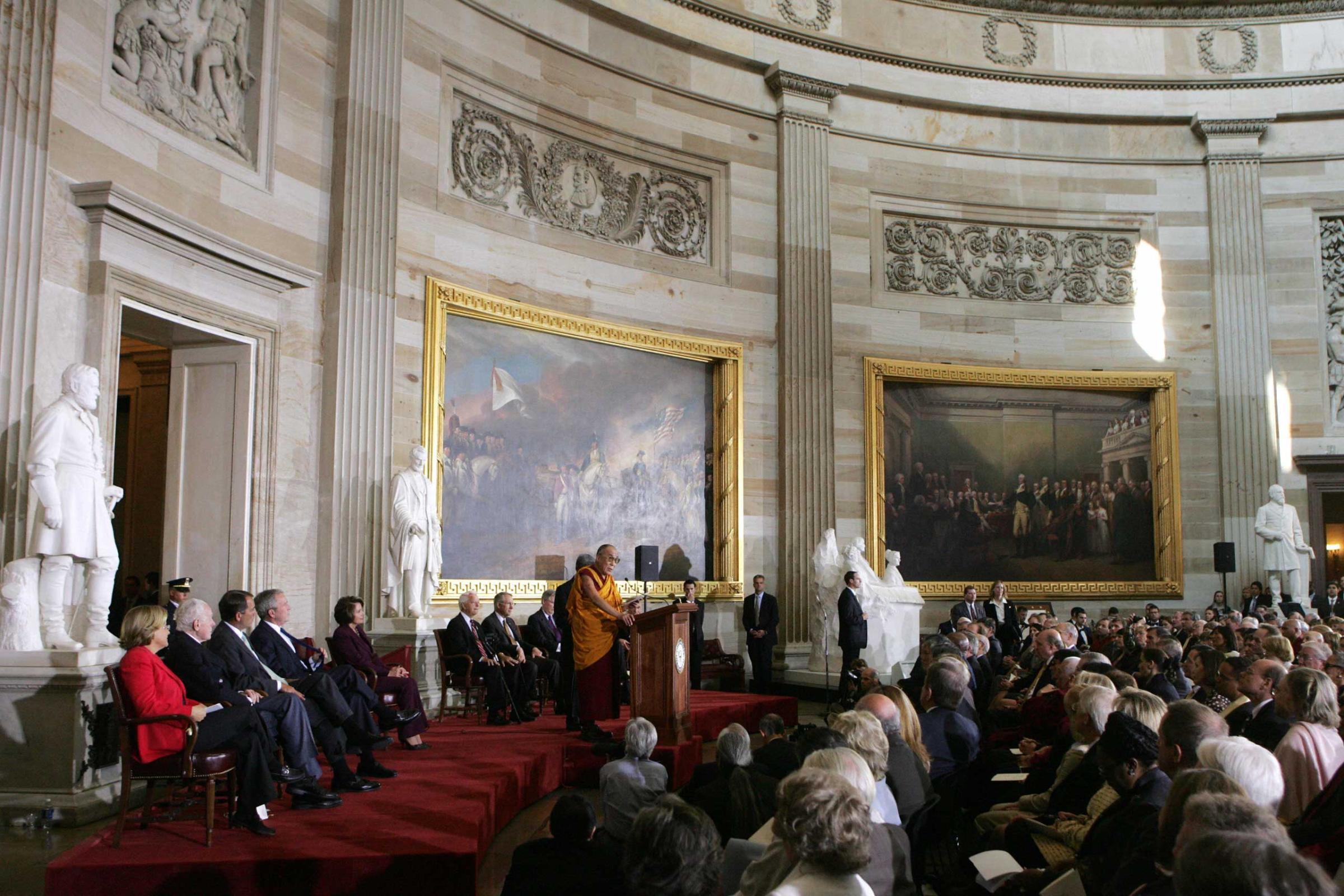 The Dalai Lama speaks during a ceremony presenting him with the Congressional Gold Medal in the Rotunda of the US Capitol in Washington, DC, Oct. 2007.