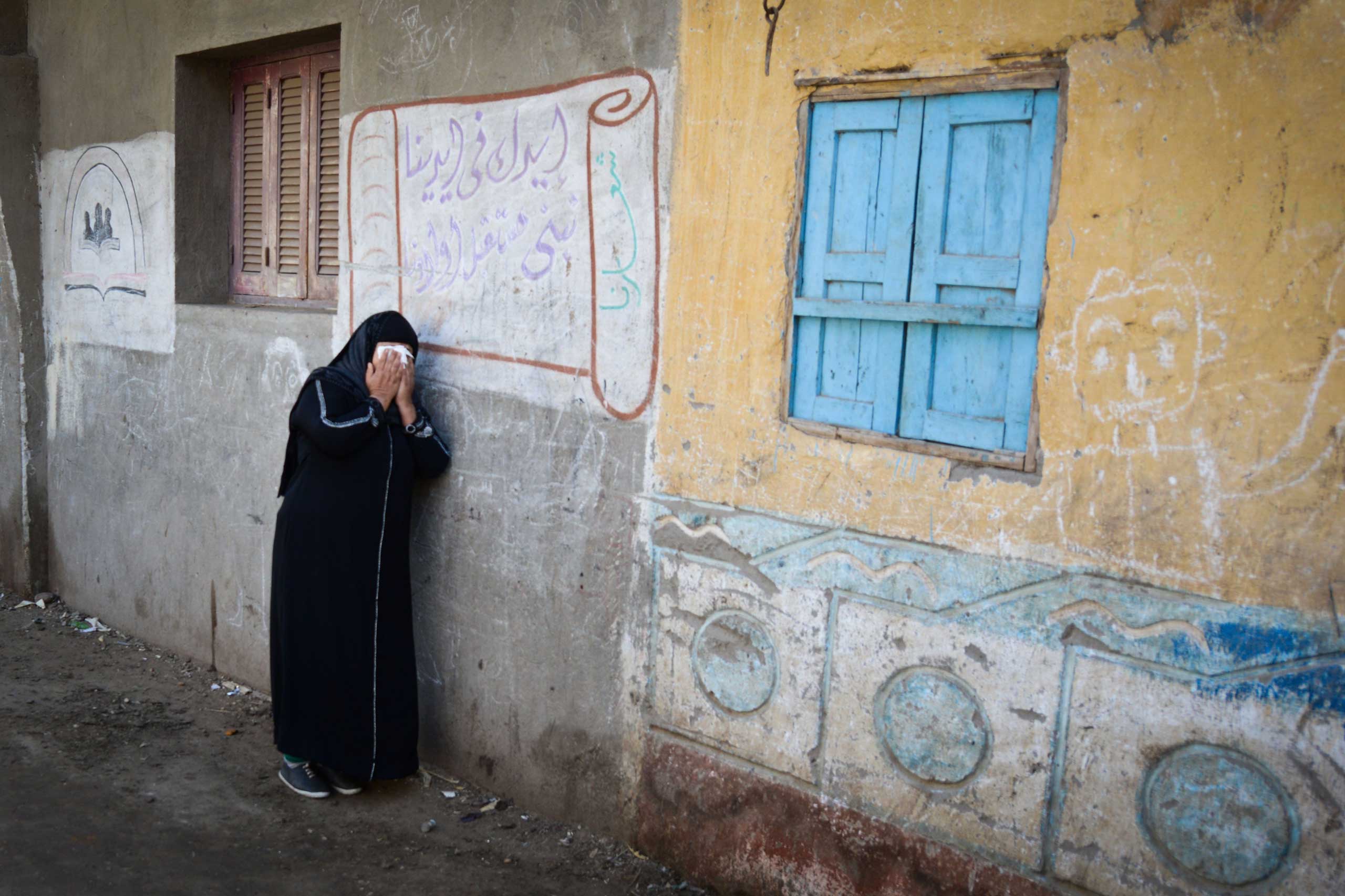 A relative of one of the Egyptian Coptic Christians purportedly killed by ISIS militants in Libya reacts after hearing the news on Feb. 16, 2015 in the village of Al-Our in Egypt's southern province of Minya.