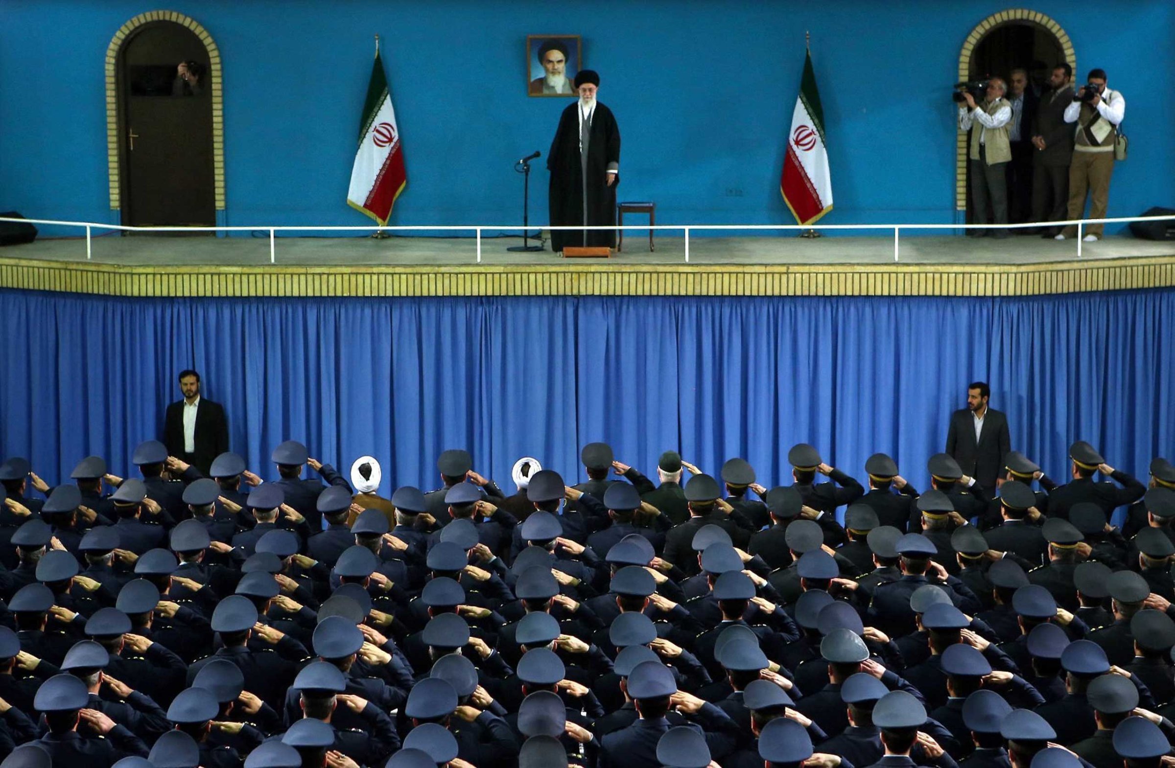 Army air force officers salute Supreme Leader Ayatollah Ali Khamenei during a ceremony in Tehran, Feb. 8, 2015.