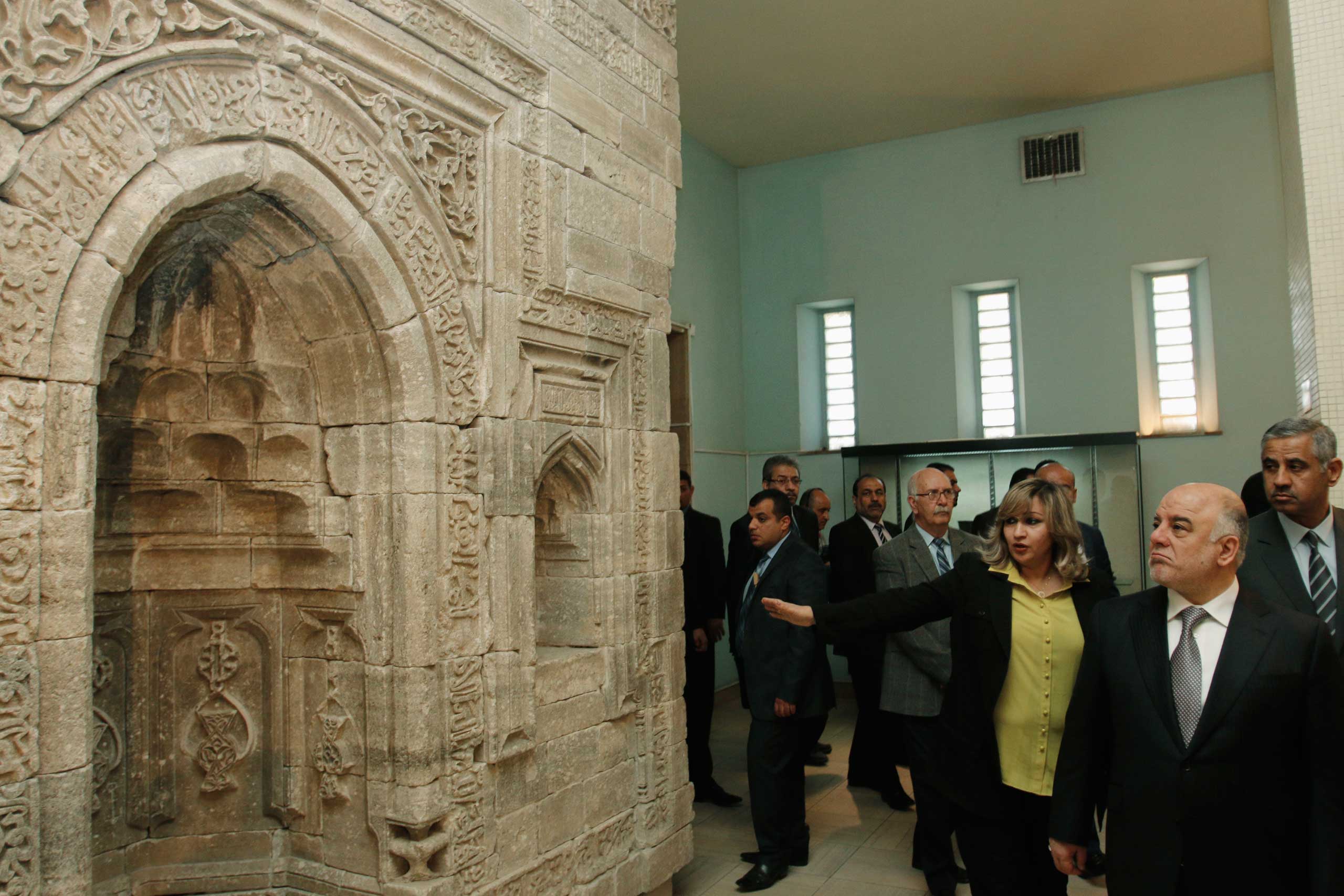 Iraqi Prime Minister Haider al-Abadi, right, visits the Iraqi National Museum in Baghdad Feb. 28, 2015. (Reuters)