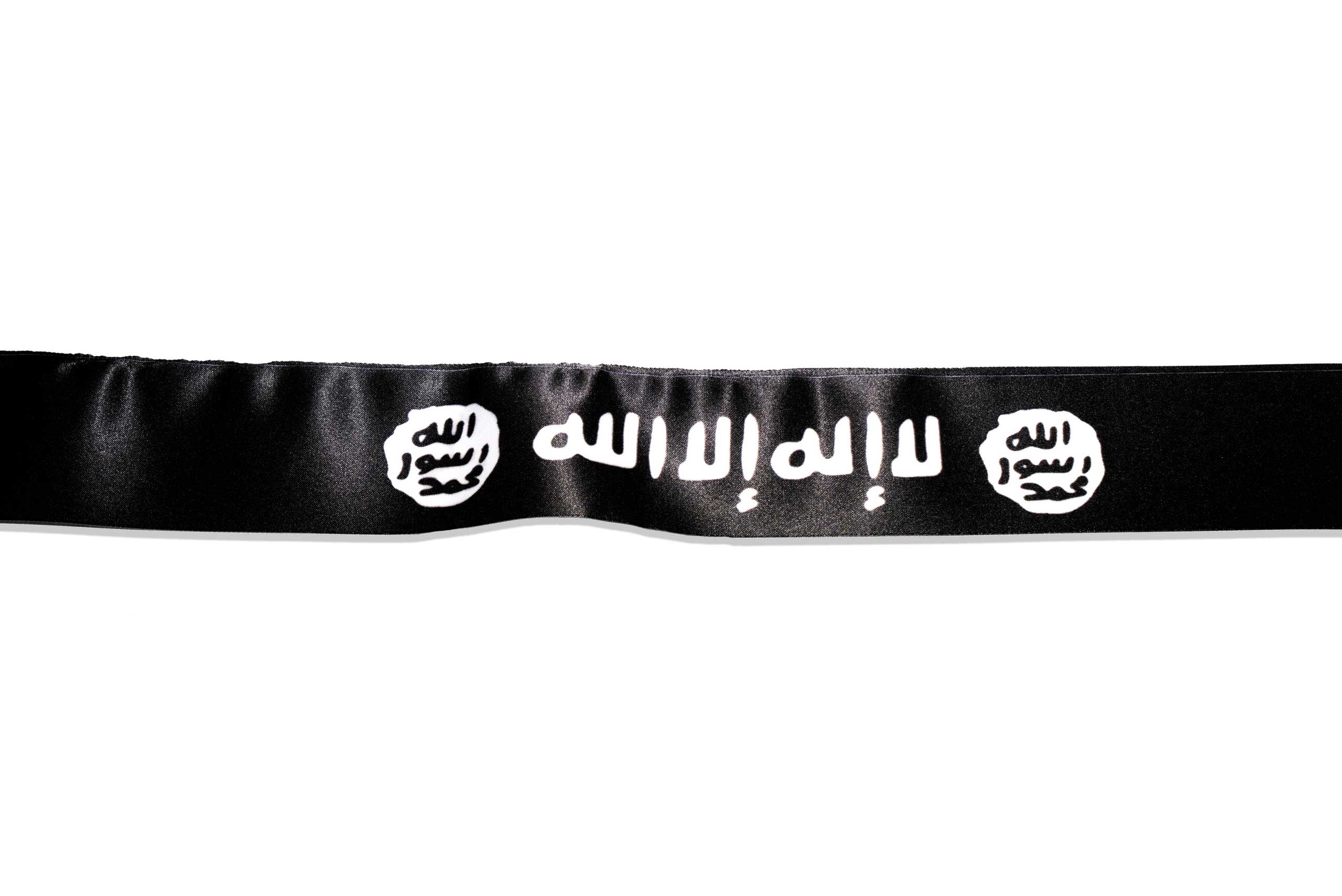 Head band featuring the islamic iconography of Jihad, found in a Islamic clothing and accessory shop in the Bagcilar district of Istanbul, Turkey.