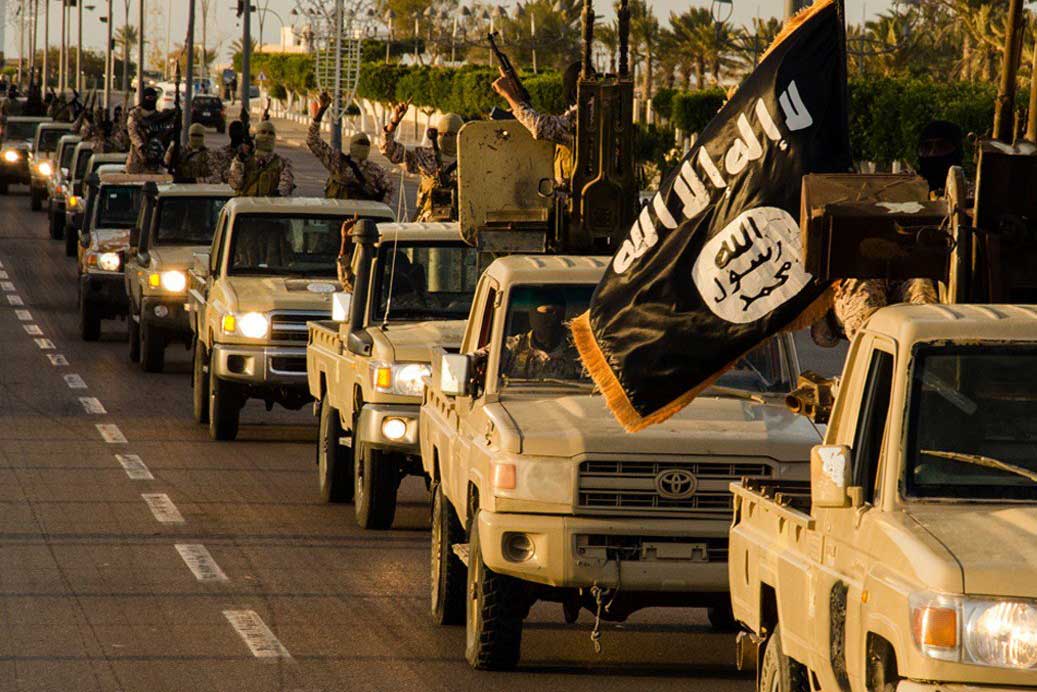 An image made available by propaganda Islamist media outlet Welayat Tarablos allegedly shows members of the Islamic State (IS) militant group parading in a street in Libya's coastal city of Sirte, released on Feb. 18, 2015. (AFP/Getty Images)