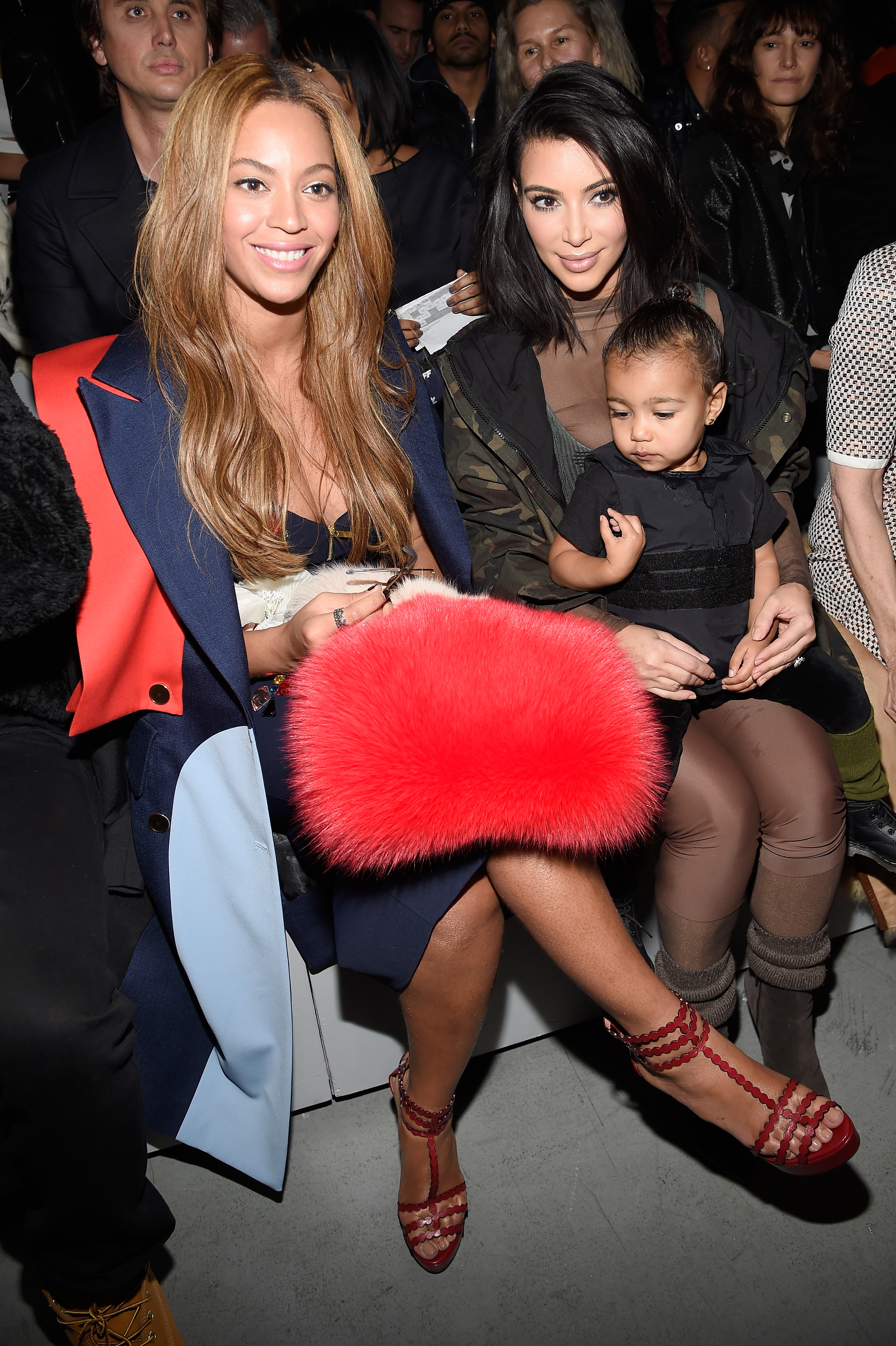 Beyonce, Kim Kardashian, and daughter North attend the adidas Originals x Kanye West YEEZY SEASON 1 fashion show during New York Fashion Week Fall 2015 at Skylight Clarkson Sq on February 12, 2015 in New York City. (Kevin Mazur&mdash;Getty Images)