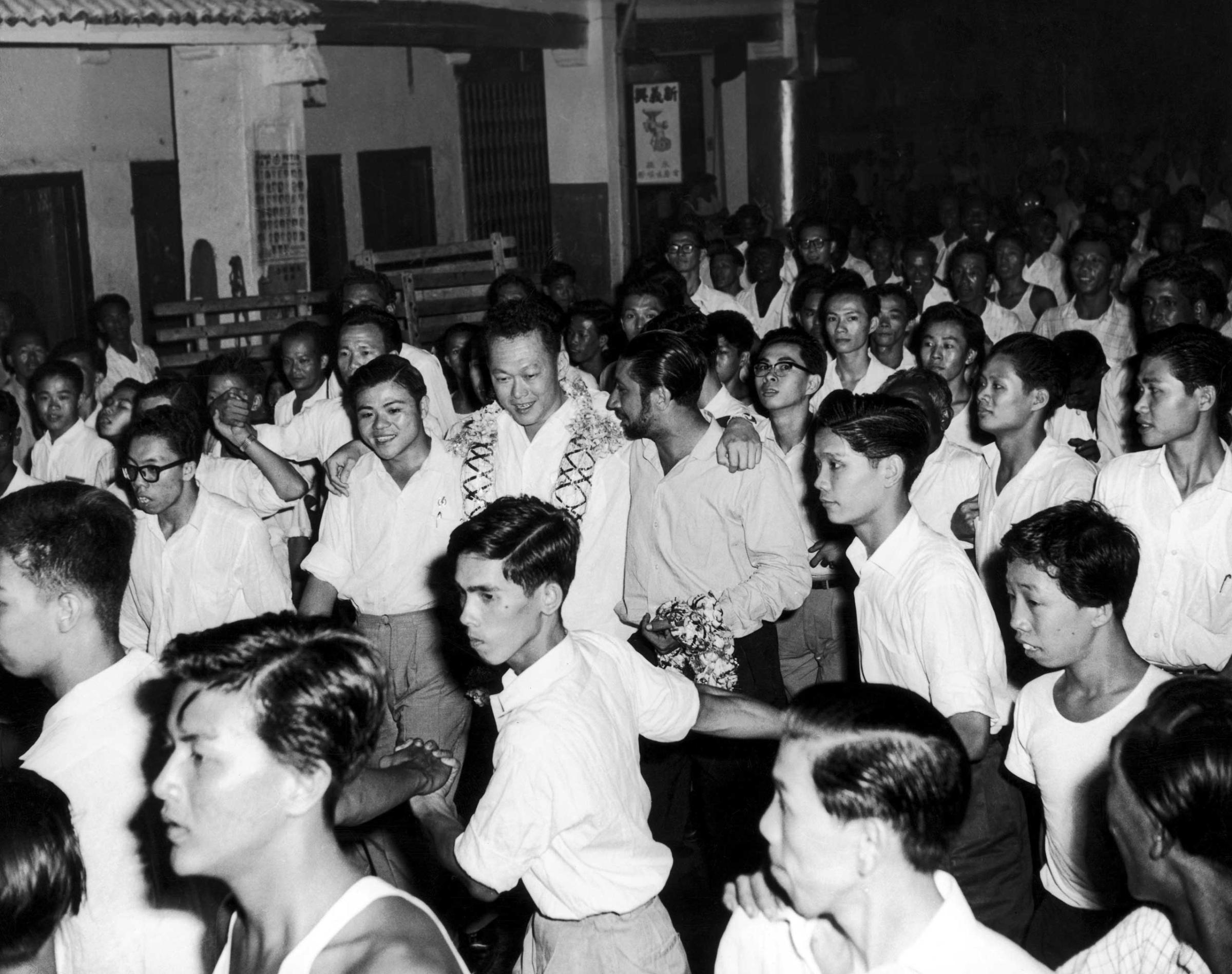 The General Secretary of People's Action Party of Singapore and the new Prime Minister Lee Kwan Yew congratulated by his supporters in 1959.
