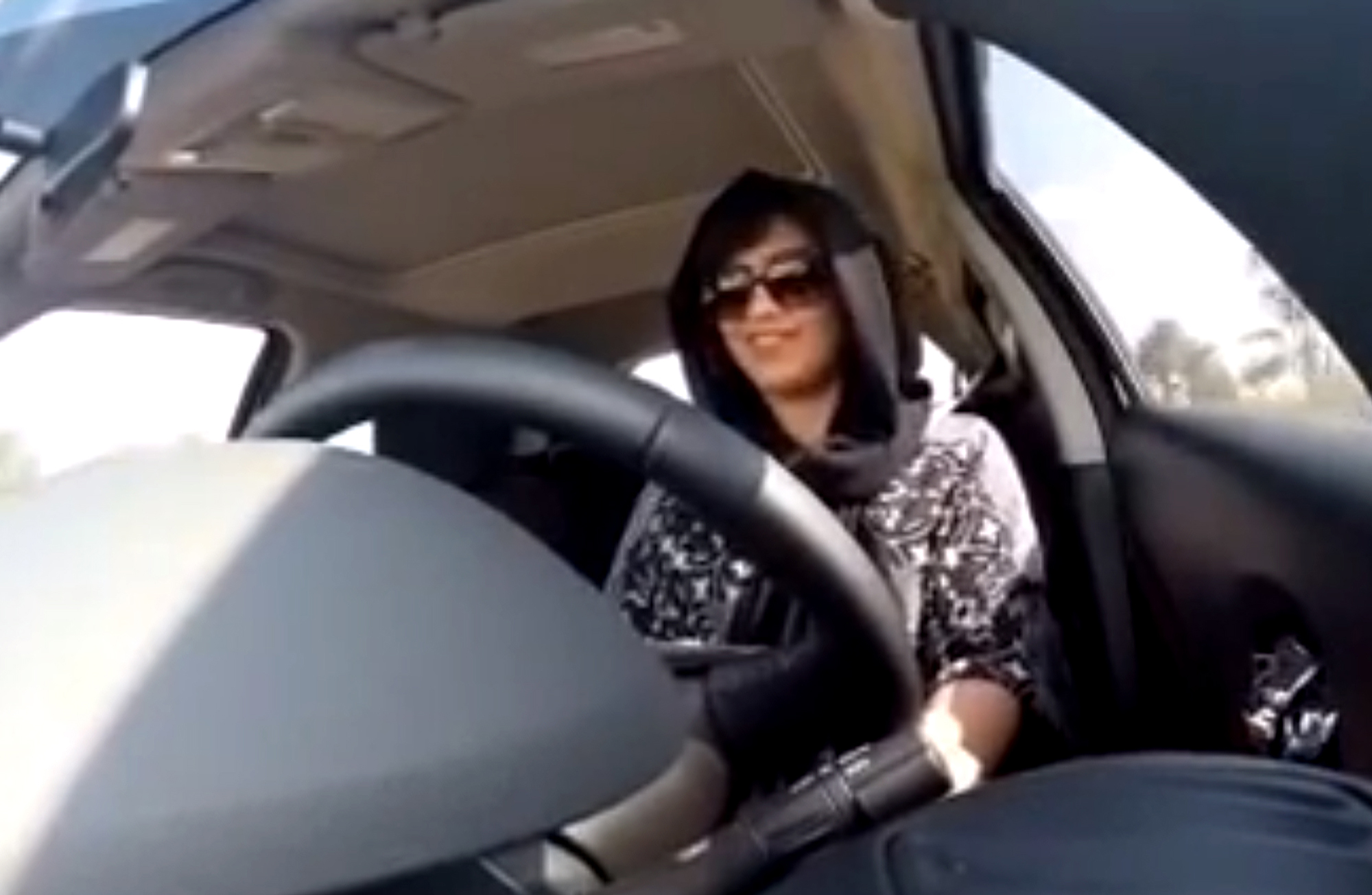A screenshot from a video released by Loujain al-Hathloul on Nov. 30, 2014, shows her driving towards the United Arab Emirates - Saudi Arabia border before her arrest on Dec. 1, 2014, in Saudi Arabia. (Loujain al-Hathloul—AP)