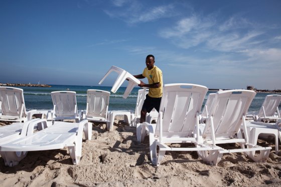 Eritrean worker on the beach in Tel Aviv.